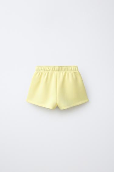 SHORT INSCRIPTION RELIEF SPORT - Jaune citron de Zara - Image 1