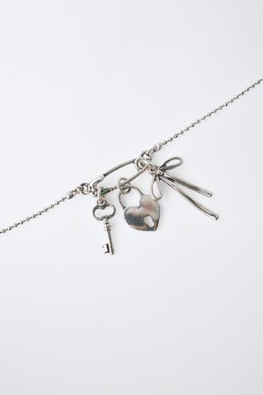 VÒNG CỔ PHỐI MẶT HÌNH CHÌA KHÓA, NƠ VÀ Ổ KHÓA - Màu bạc từ Zara