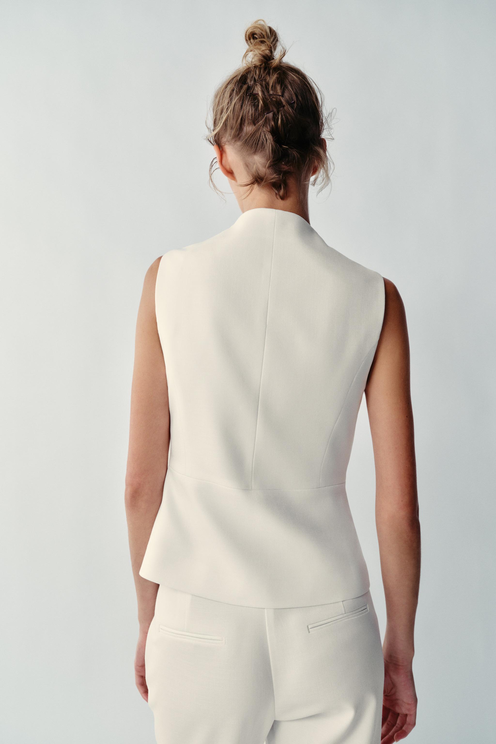 GILET PEPLUM
