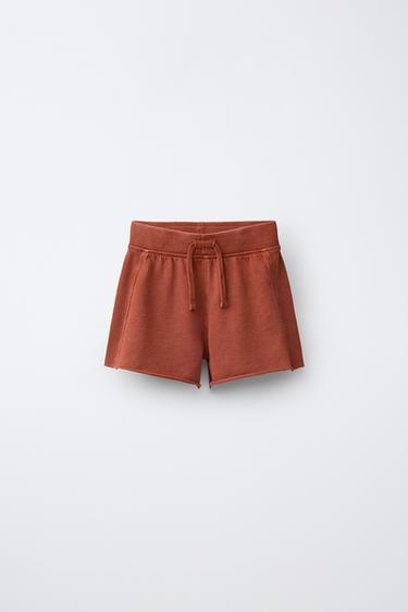 BERMUDA DE JOGGING EFFET DÉLAVÉ - Rouge orangé de Zara - Image 0