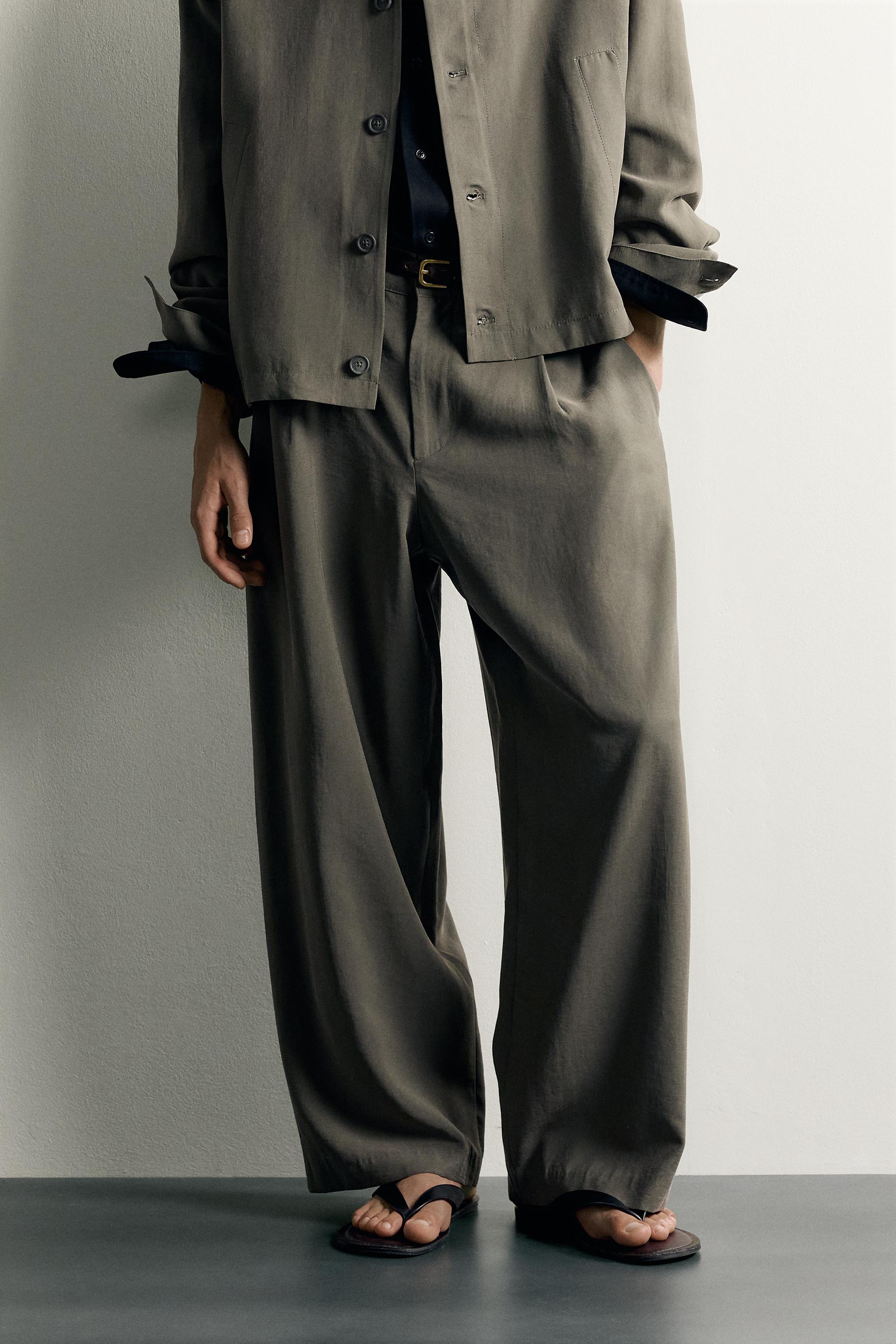 Relaxed-Fit Pleated Fluid Trousers — Ecru / Khaki