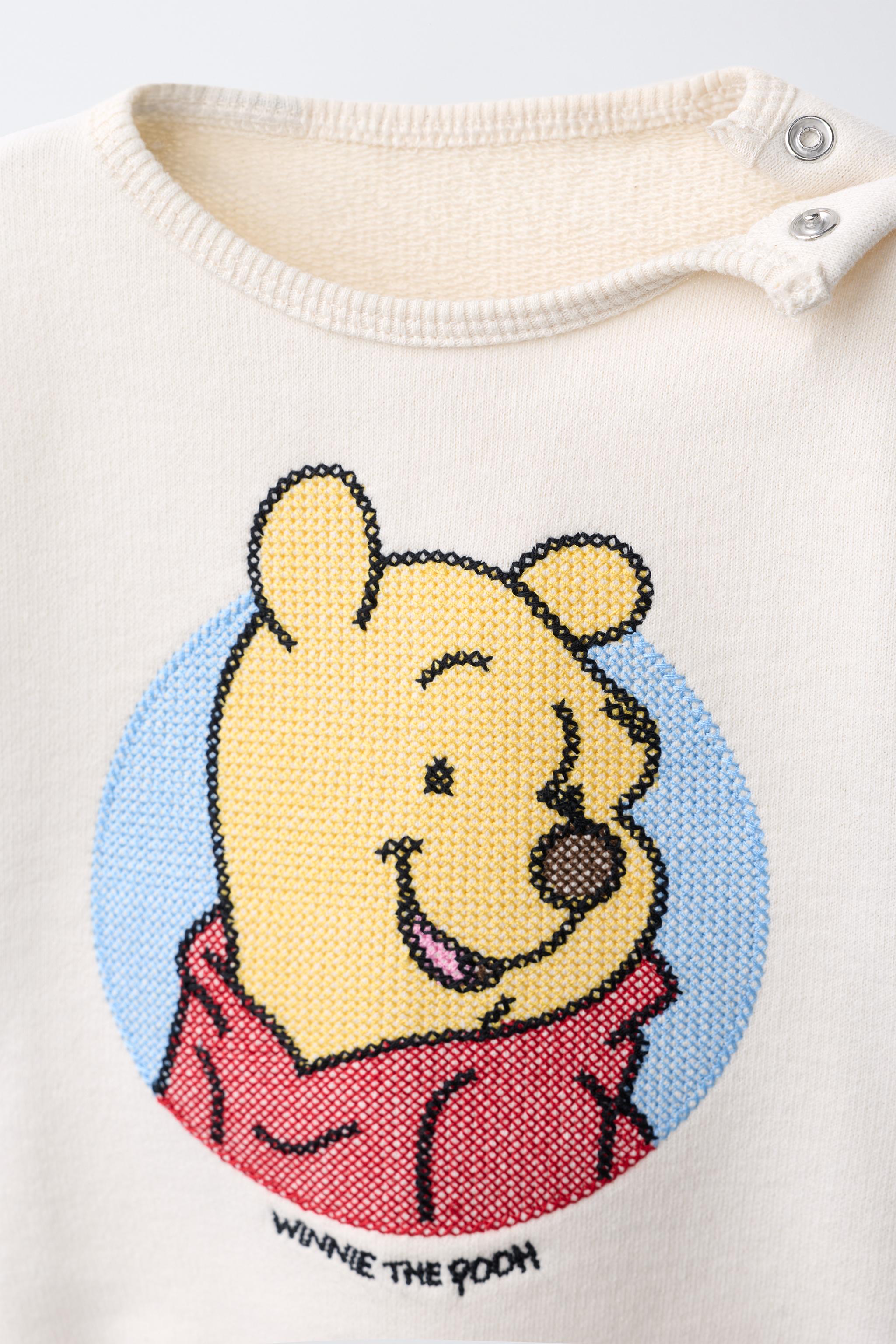 SWEAT À BRODERIES WINNIE L'OURSON © DISNEY
