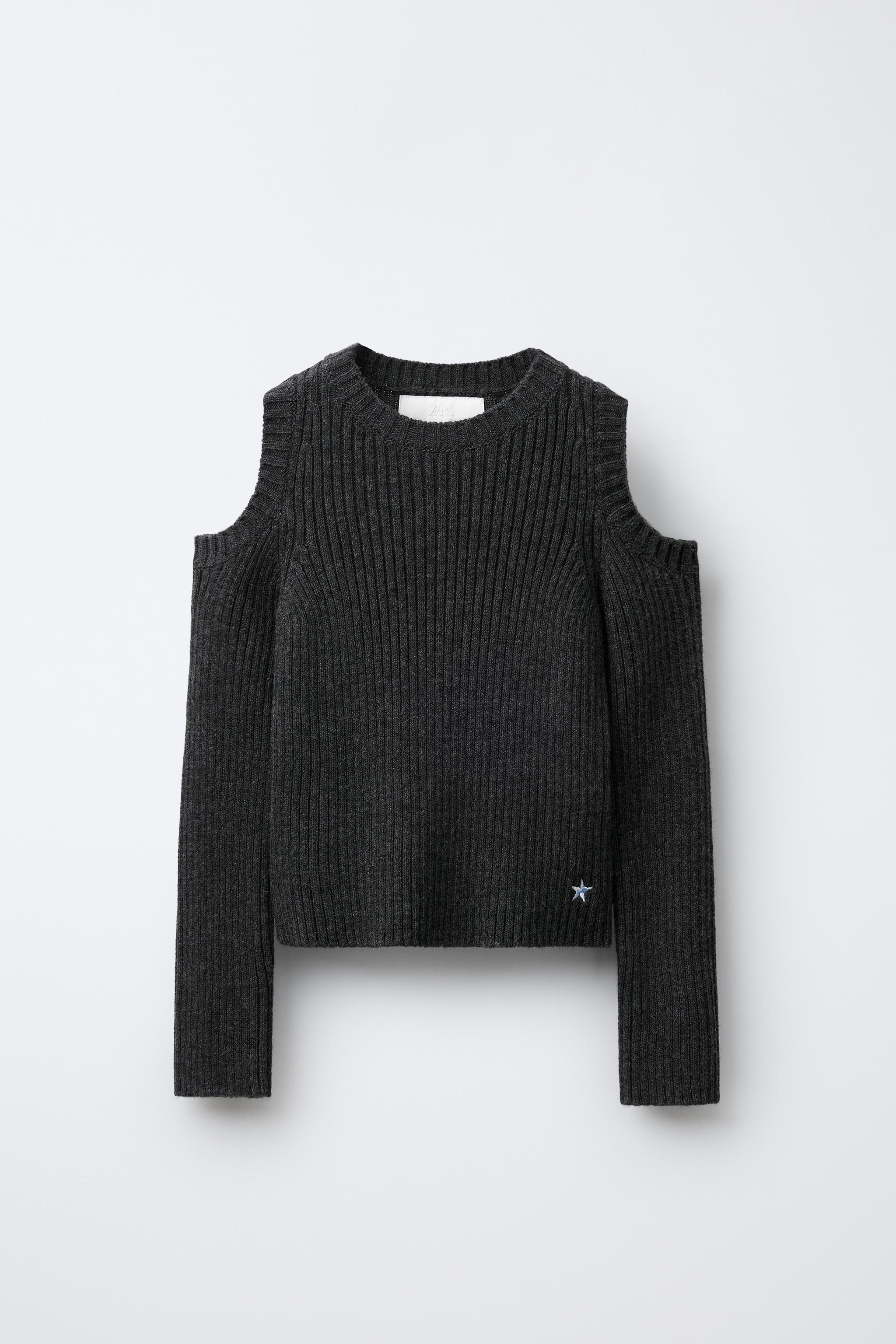 KNIT JUMPER WITH CUT-OUT AND EMBROIDERED STAR