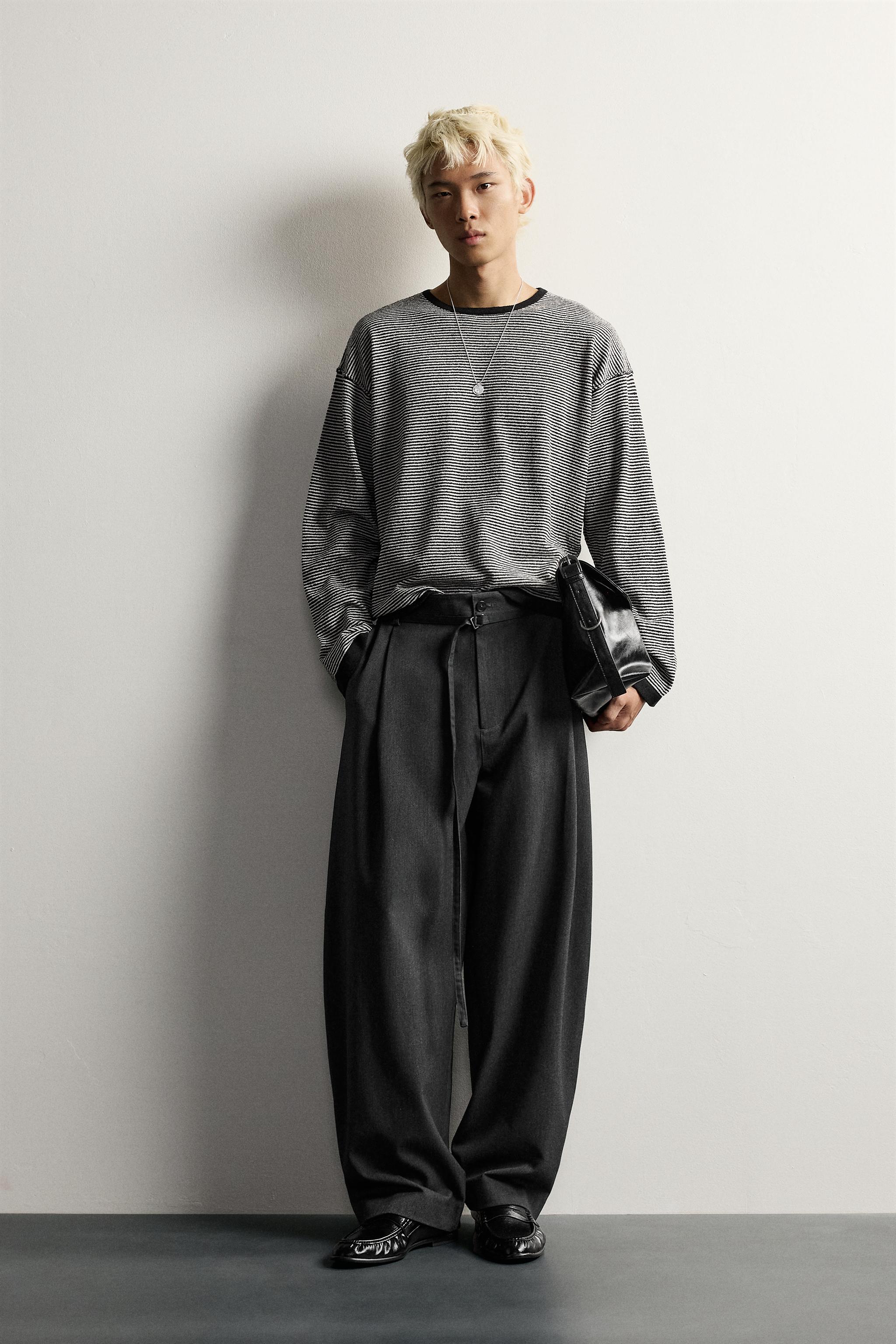 BELTED PLEATED BALLOON FIT PANTS
