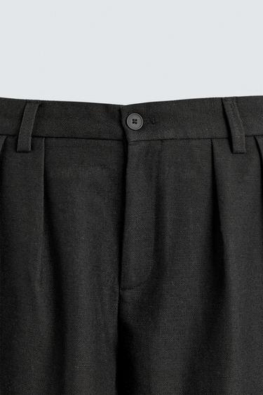 PANTALÓN RELAXED FIT PLIEGUES - Negro de Zara