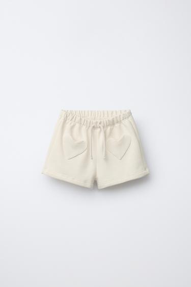 BERMUDA FELPA BOLSILLOS CORAZÓN - Crudo de Zara