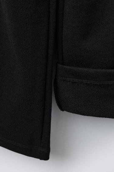 PANTALON EN MOLLETON À JAMBES LARGES ÉTOILES - Noir de Zara - Image 3