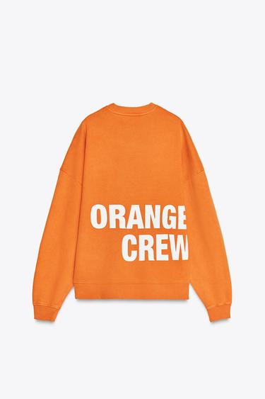 SVETARI KONTRASTIVÄRISELLÄ TEKSTIPRINTILLÄ - Orange Zaralta