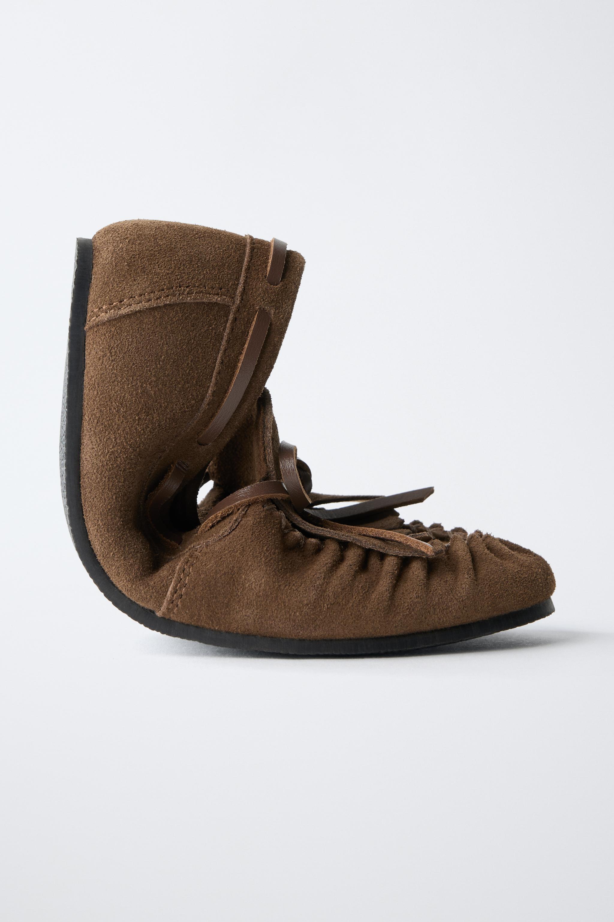 MOCASSINS À FRANGES