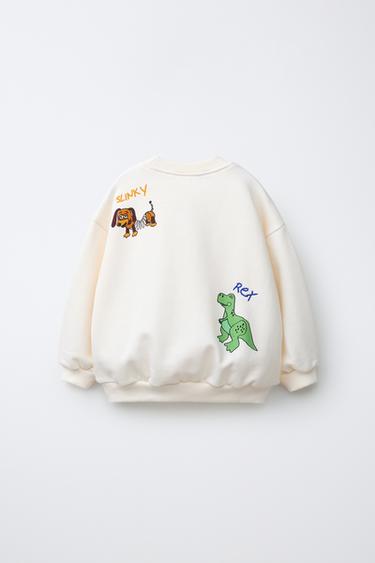 ТОЛСТОВКА С ВЫШИВКОЙ ИСТОРИЯ ИГРУШЕК © DISNEY PIXAR — ЭКРЮ от Zara