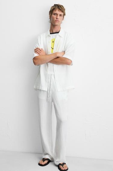 CRINKLED-EFFECT TROUSERS - White by Zara