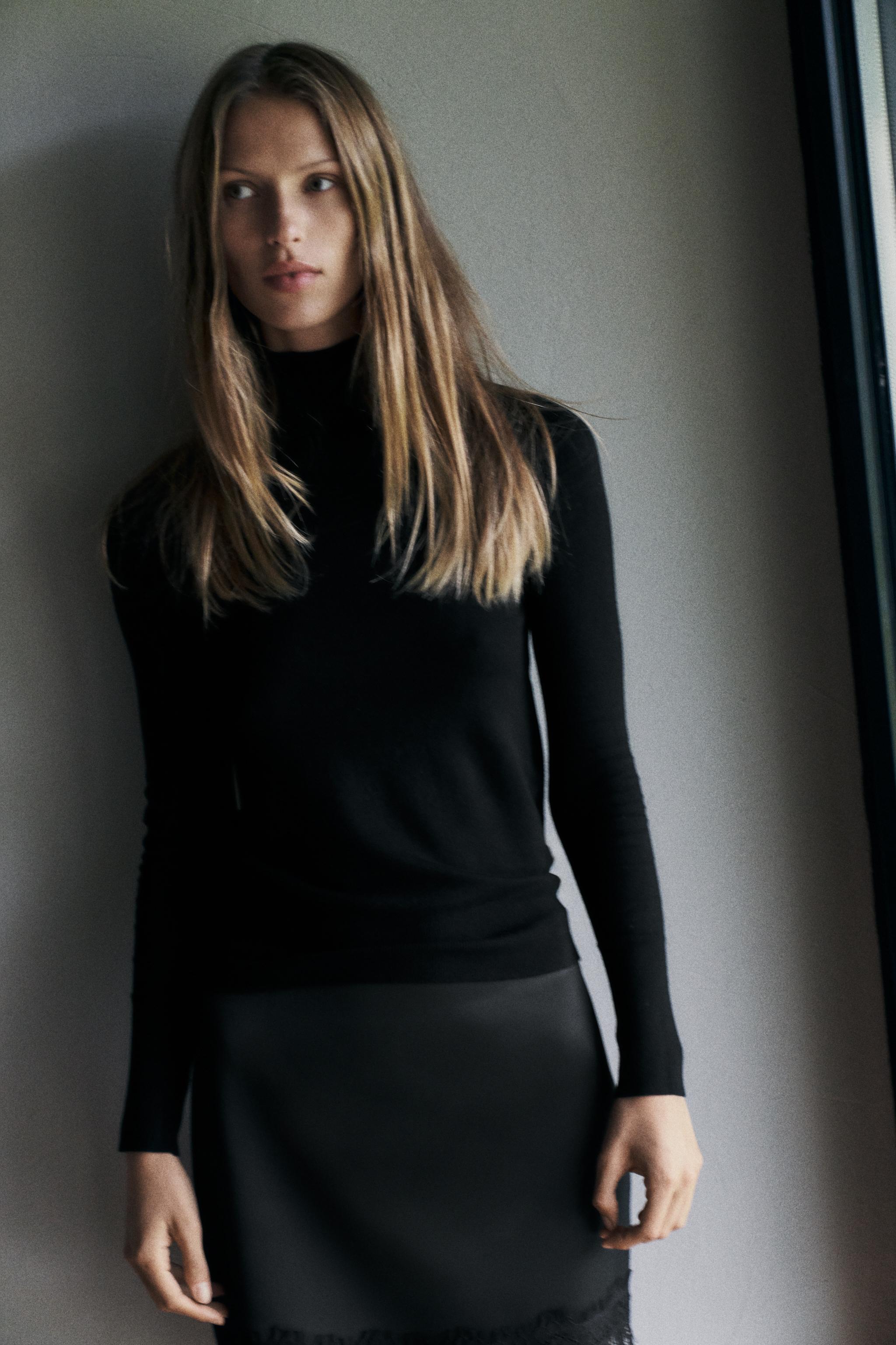 BUTTON KNIT SWEATER