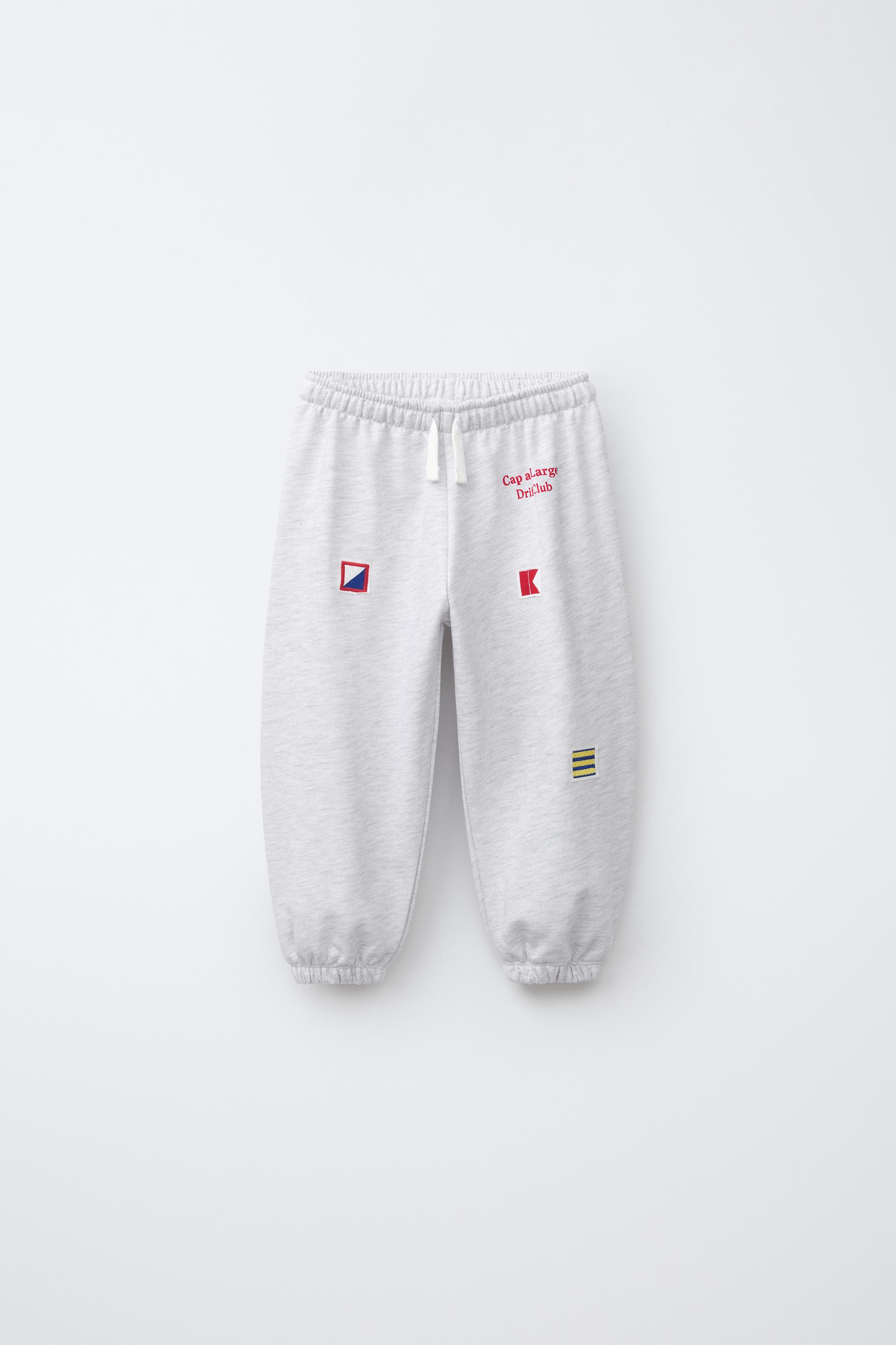 EMBROIDERED FLAG JOGGER PANTS — Gray marl