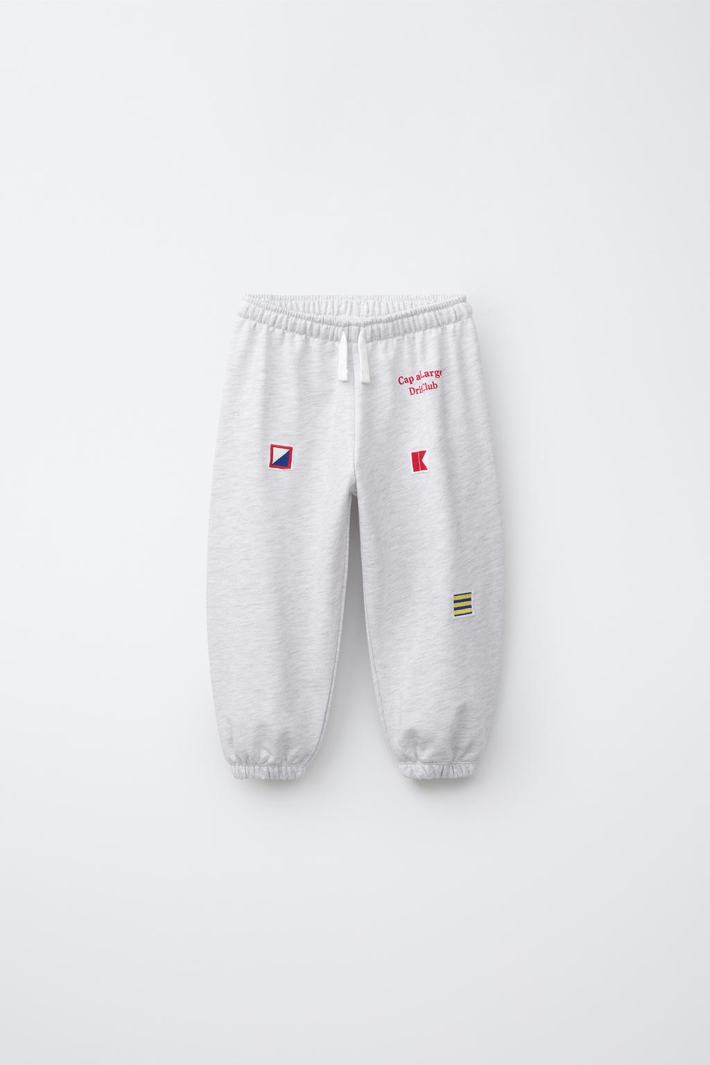 EMBROIDERED FLAG JOGGERS