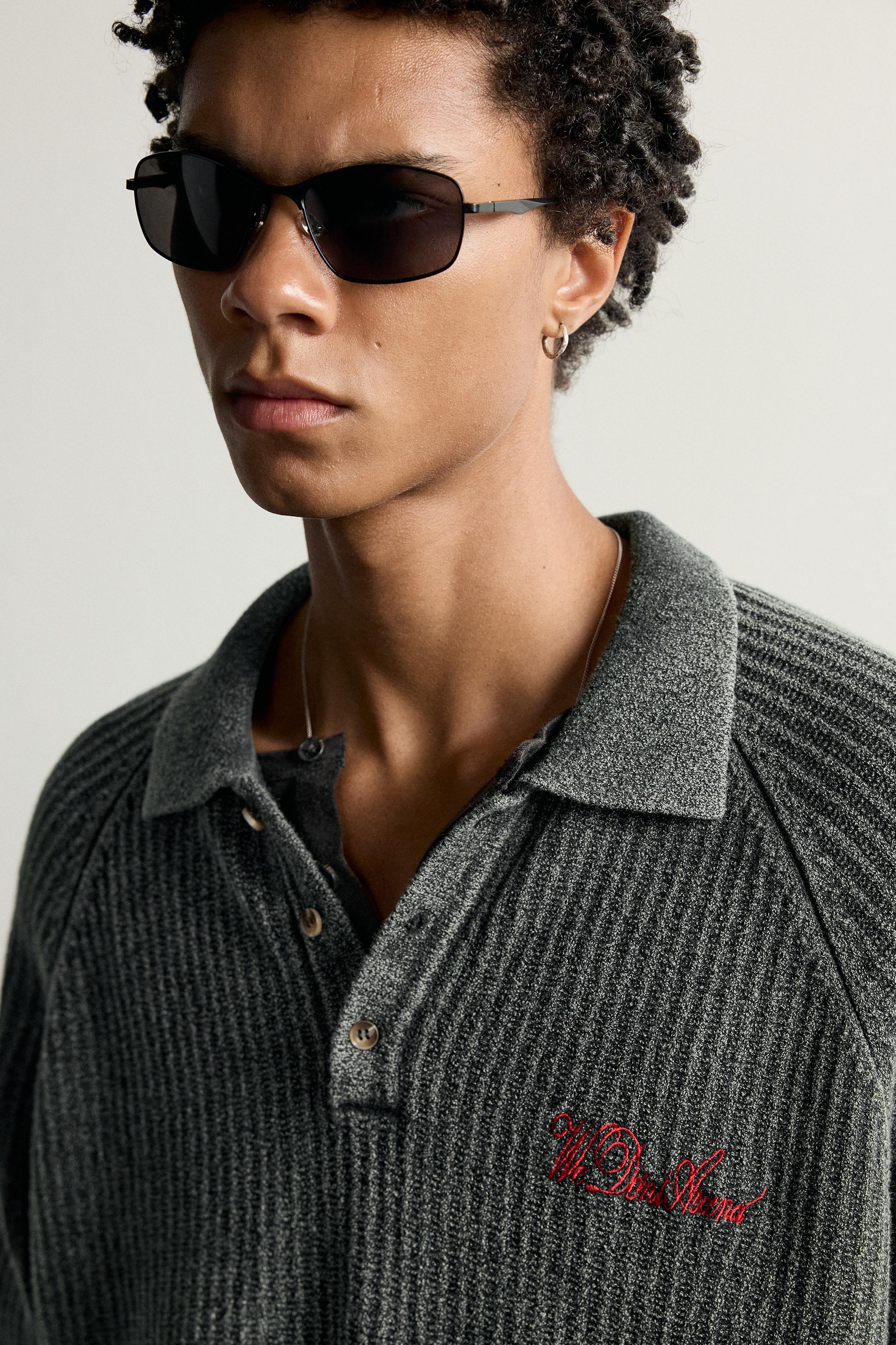 POLO EN MAILLE À ZIP ET BRODERIES