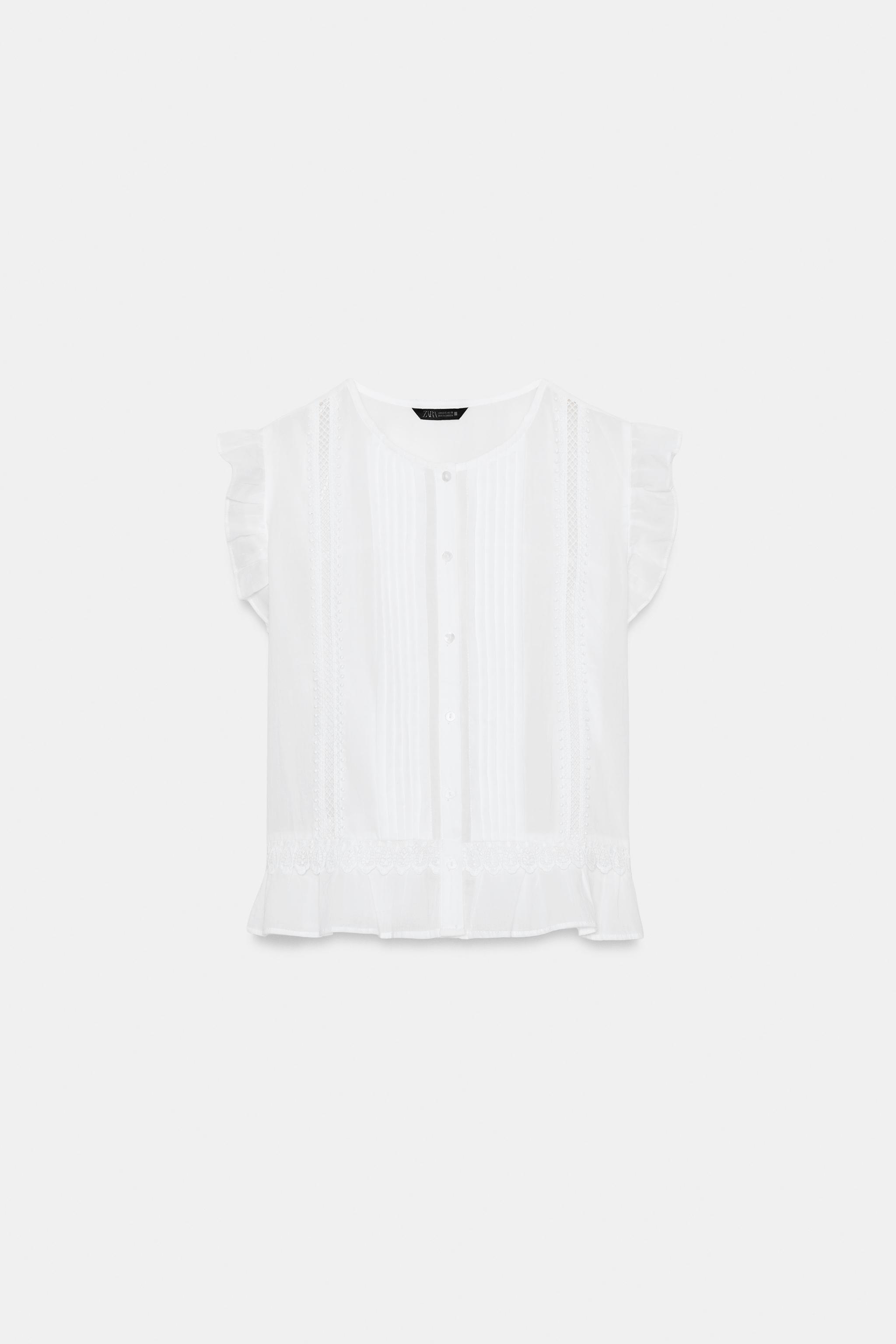 BLOUSE ENTRE-DEUX ET VOLANTS