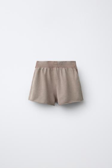 BERMUDA DE JOGGING EFFET DÉLAVÉ - Rouge orangé de Zara - Image 1