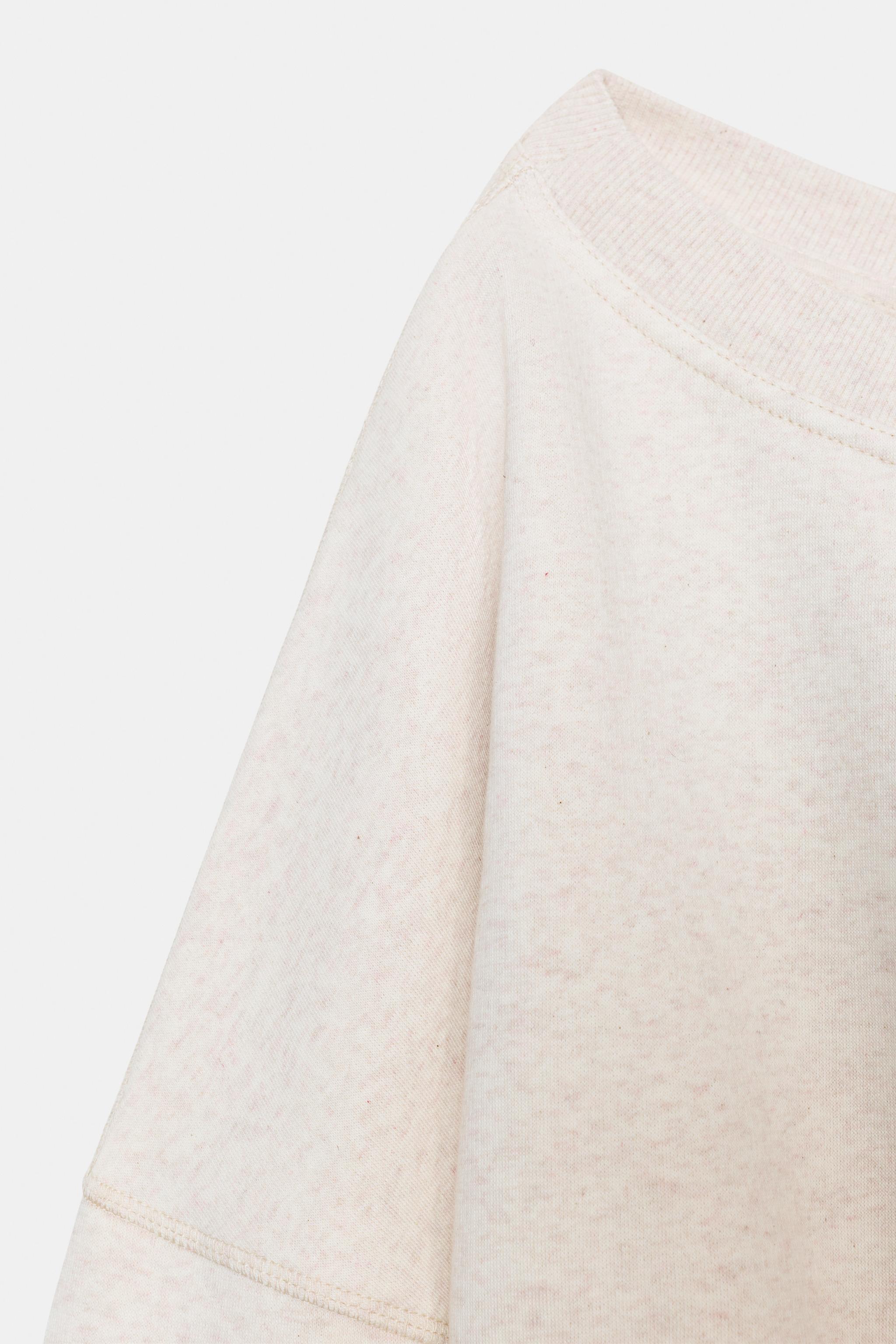 ASYMMETRIC PLUSH SWEATSHIRT