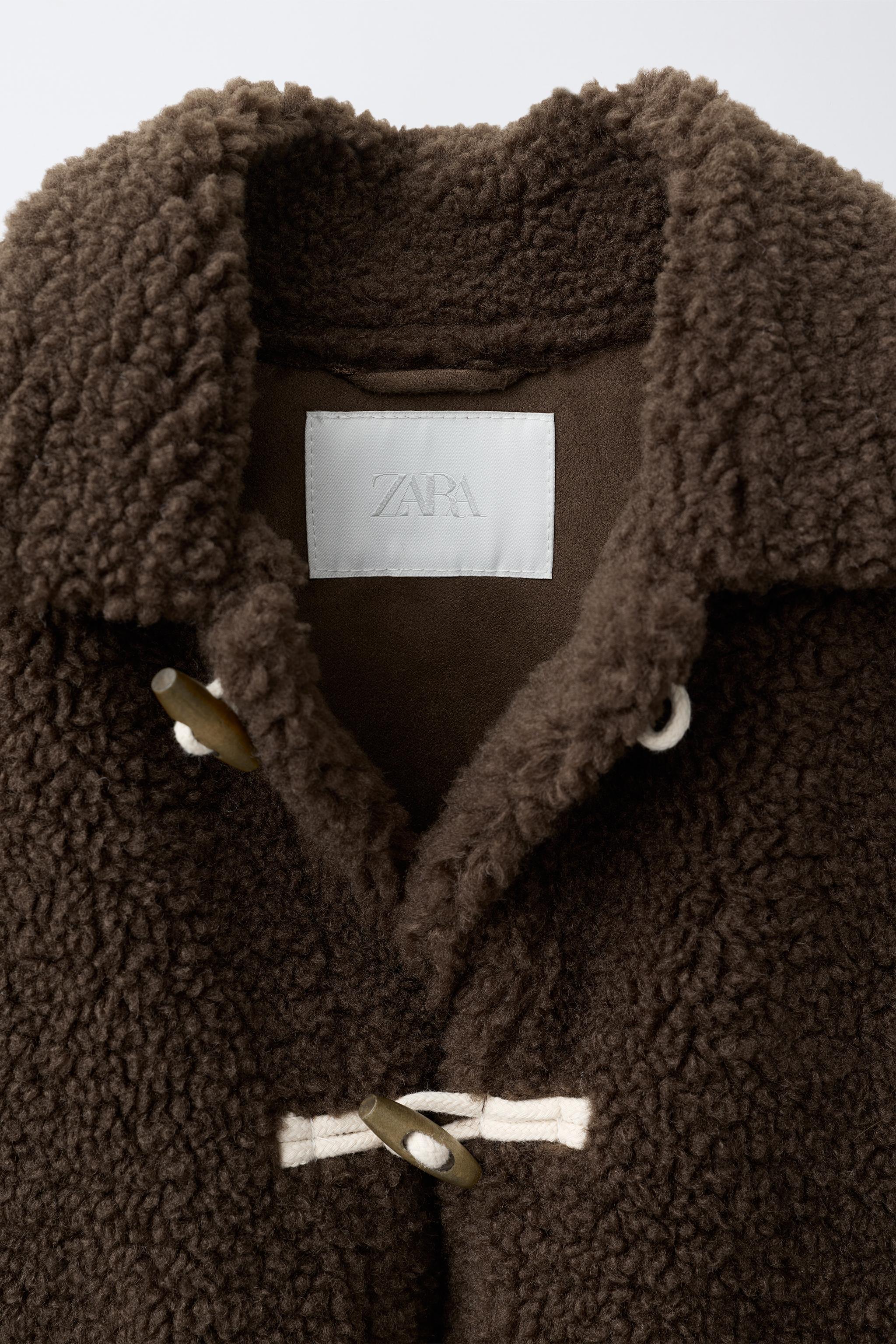 SHEARLING JACKET WITH FROG FASTENING
