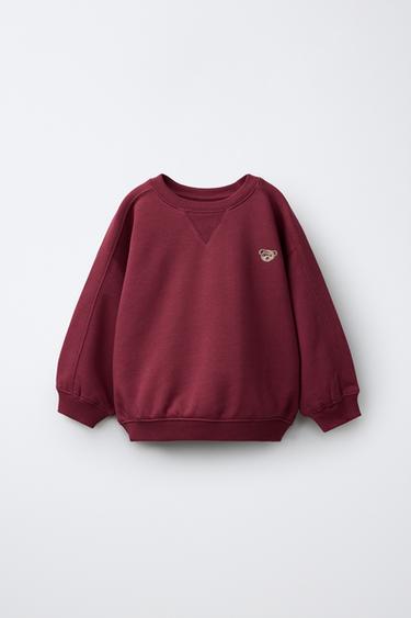 SWEATSHIRT MED BJØRNEBRODERI - granatrød fra Zara
