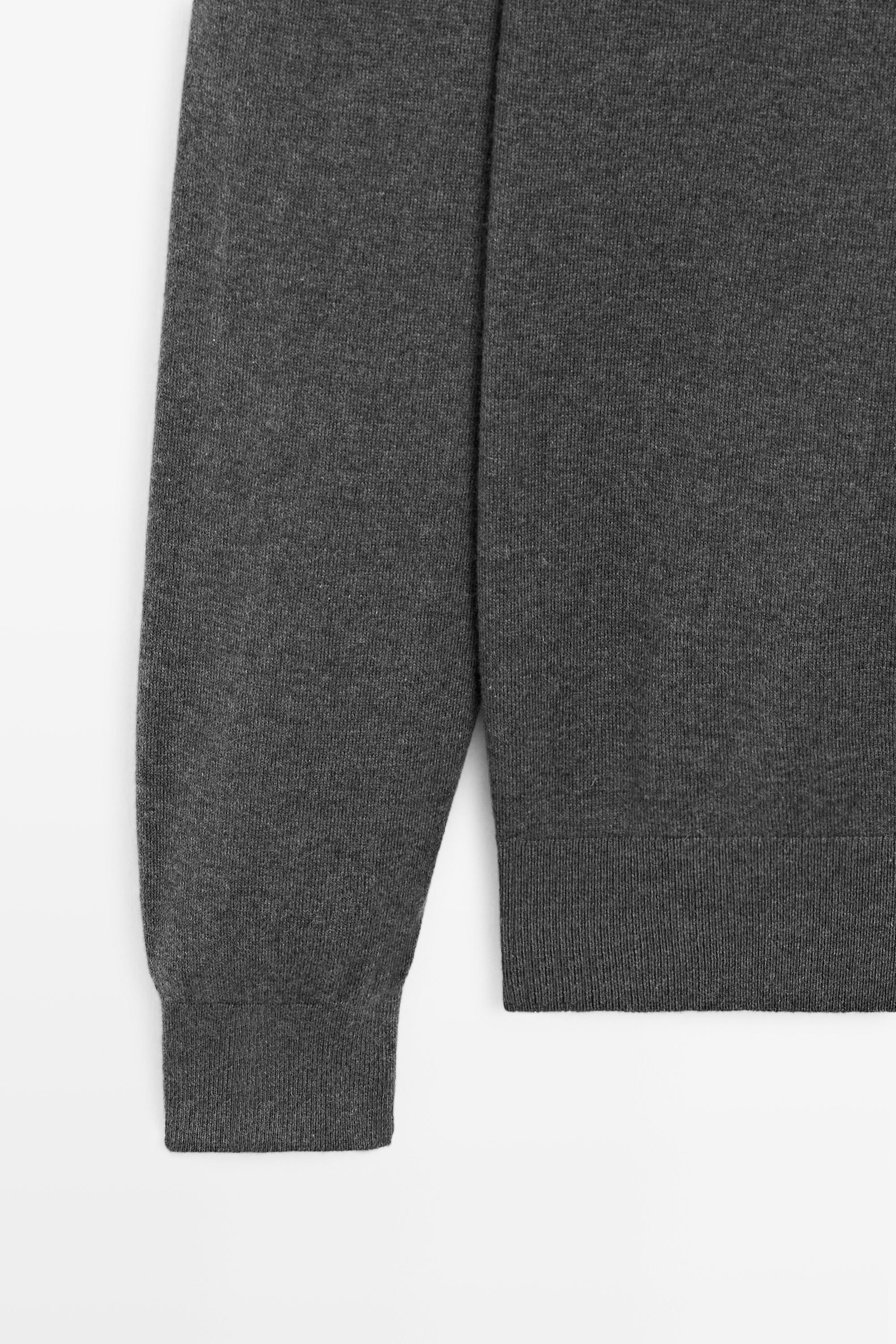 Cotton blend knit high-neck sweater