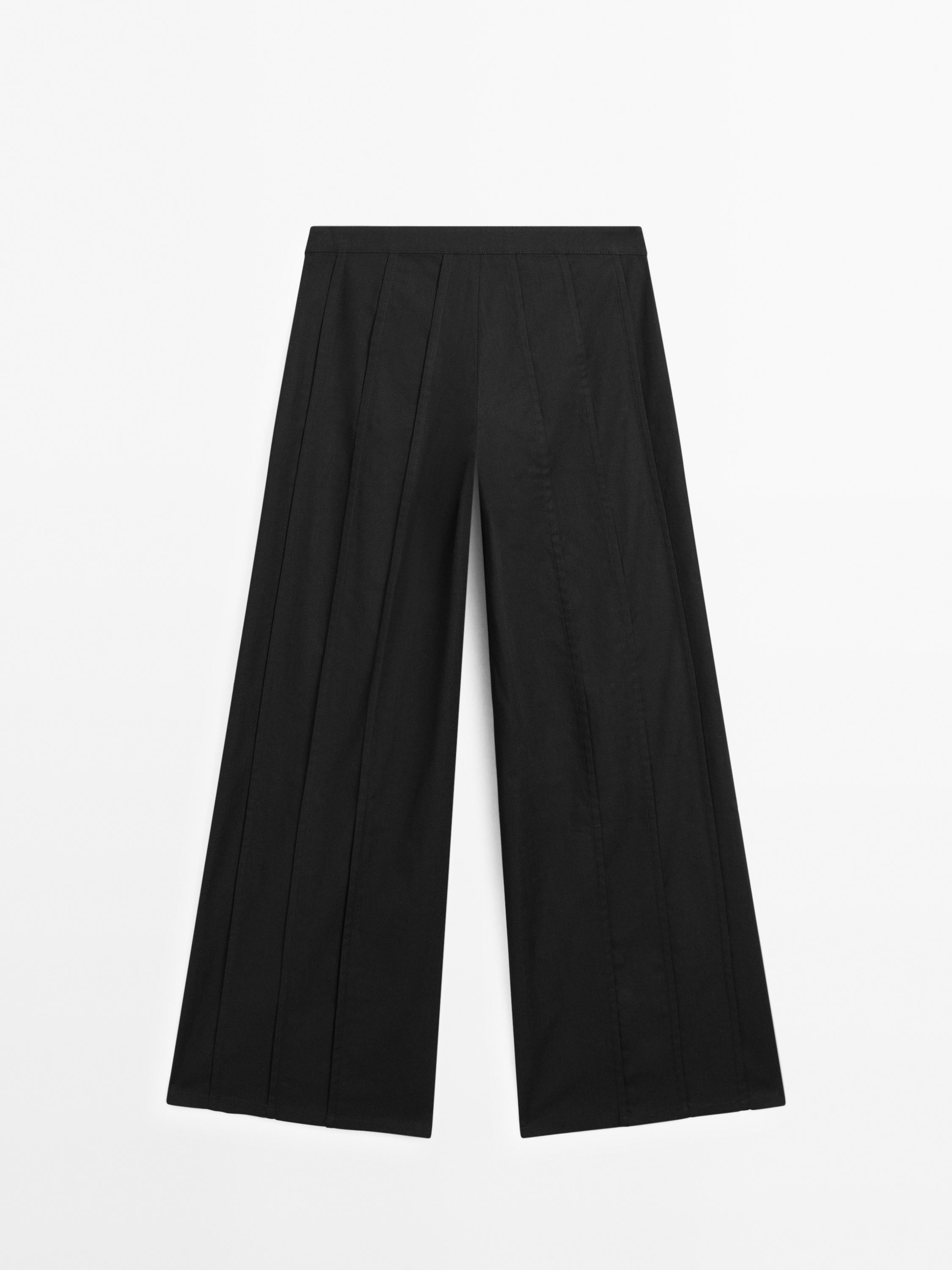 Pantalon large coutures apparentes