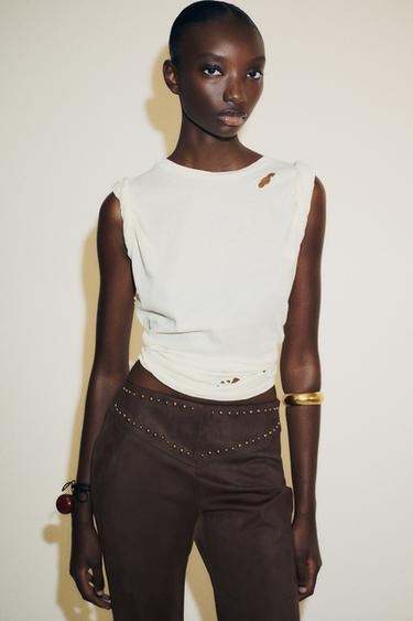 PANTALON FLARE EFFET DAIM CLOUS - Chocolat de Zara - Image 2