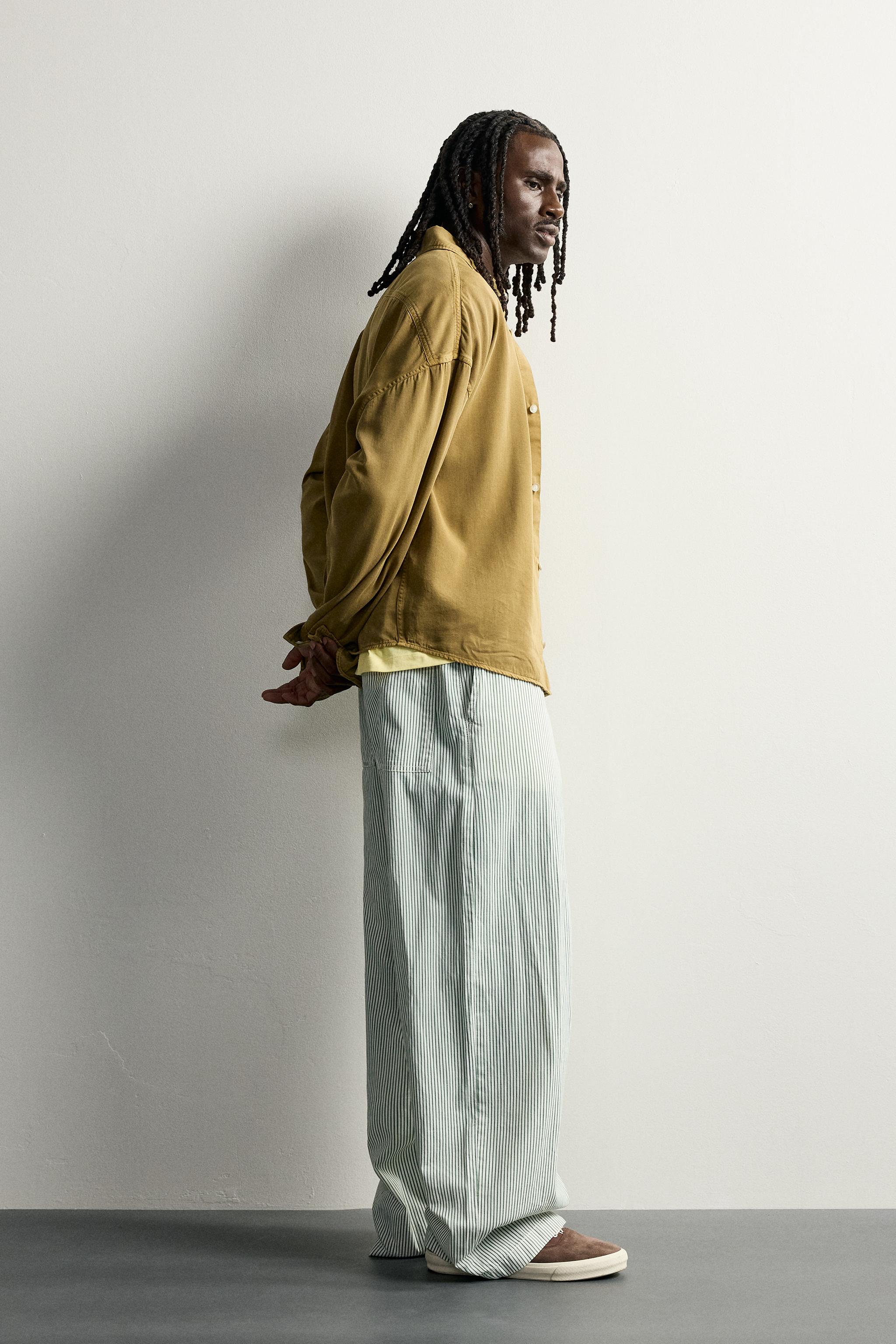 STRIPED BAGGY FIT PANTS