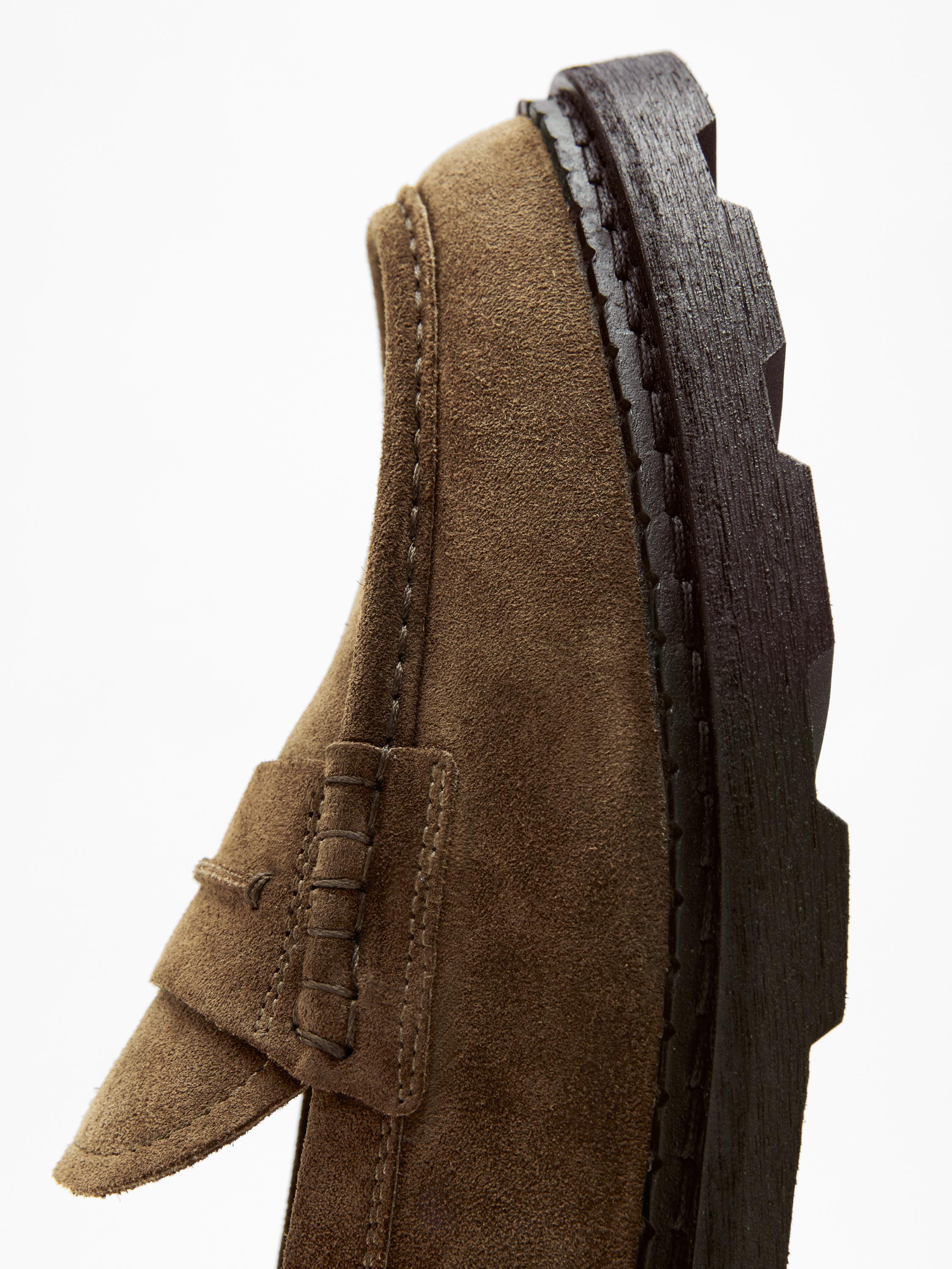 Leather track-sole loafers with penny strap