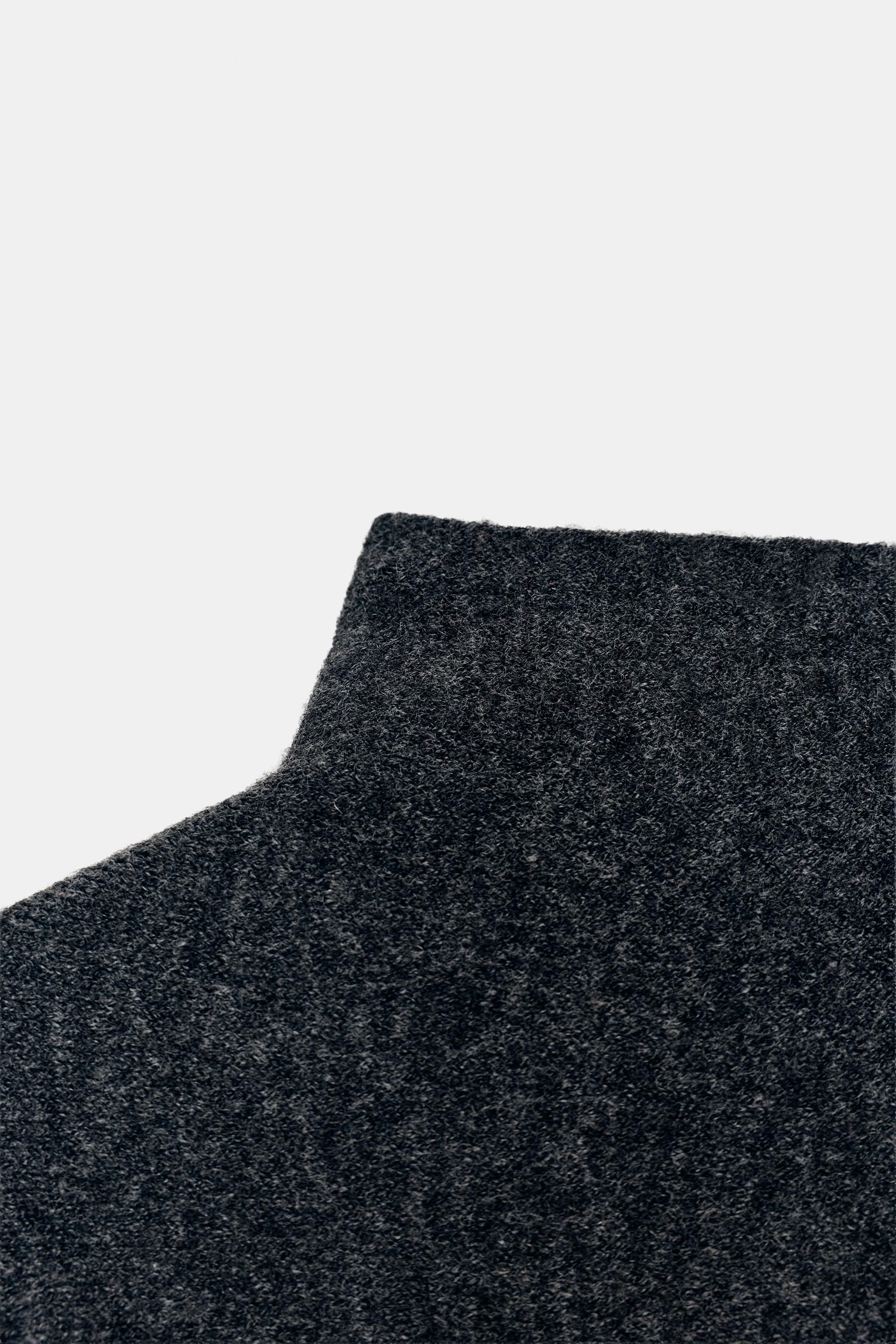 CAPE EN MAILLE À COL MONTANT