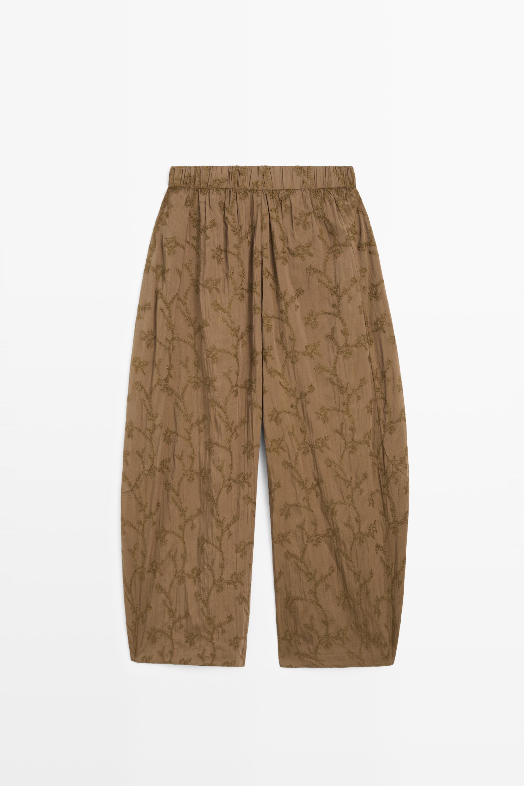 Trousers with embroidered detail and elastic waistband