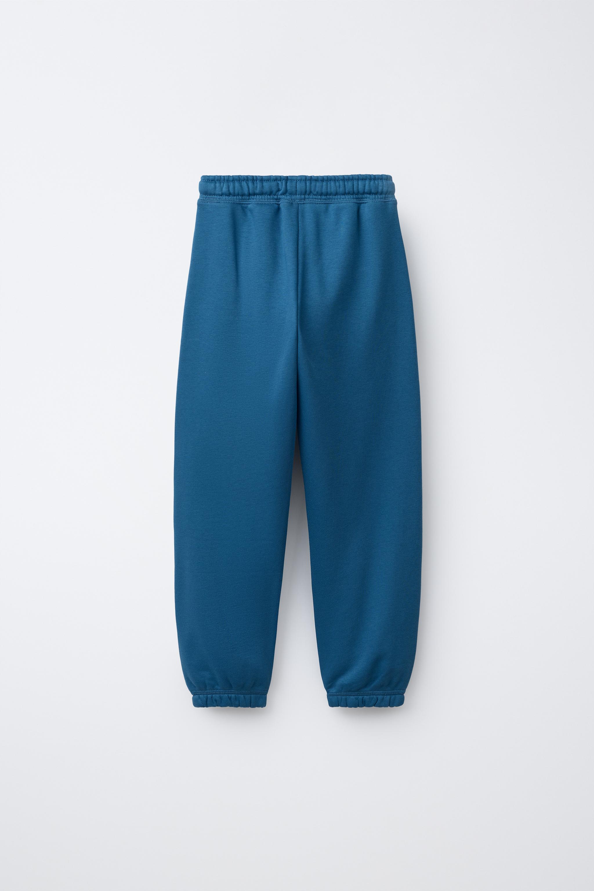 PANTALON DE JOGGING AVEC INSCRIPTION ET ÉTIQUETTE