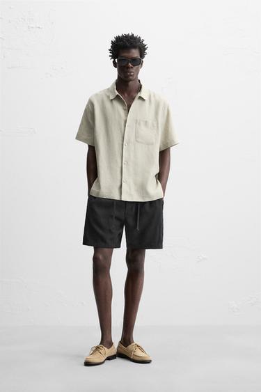 Zaras BERMUDASHORTS MED LINNE - Svart