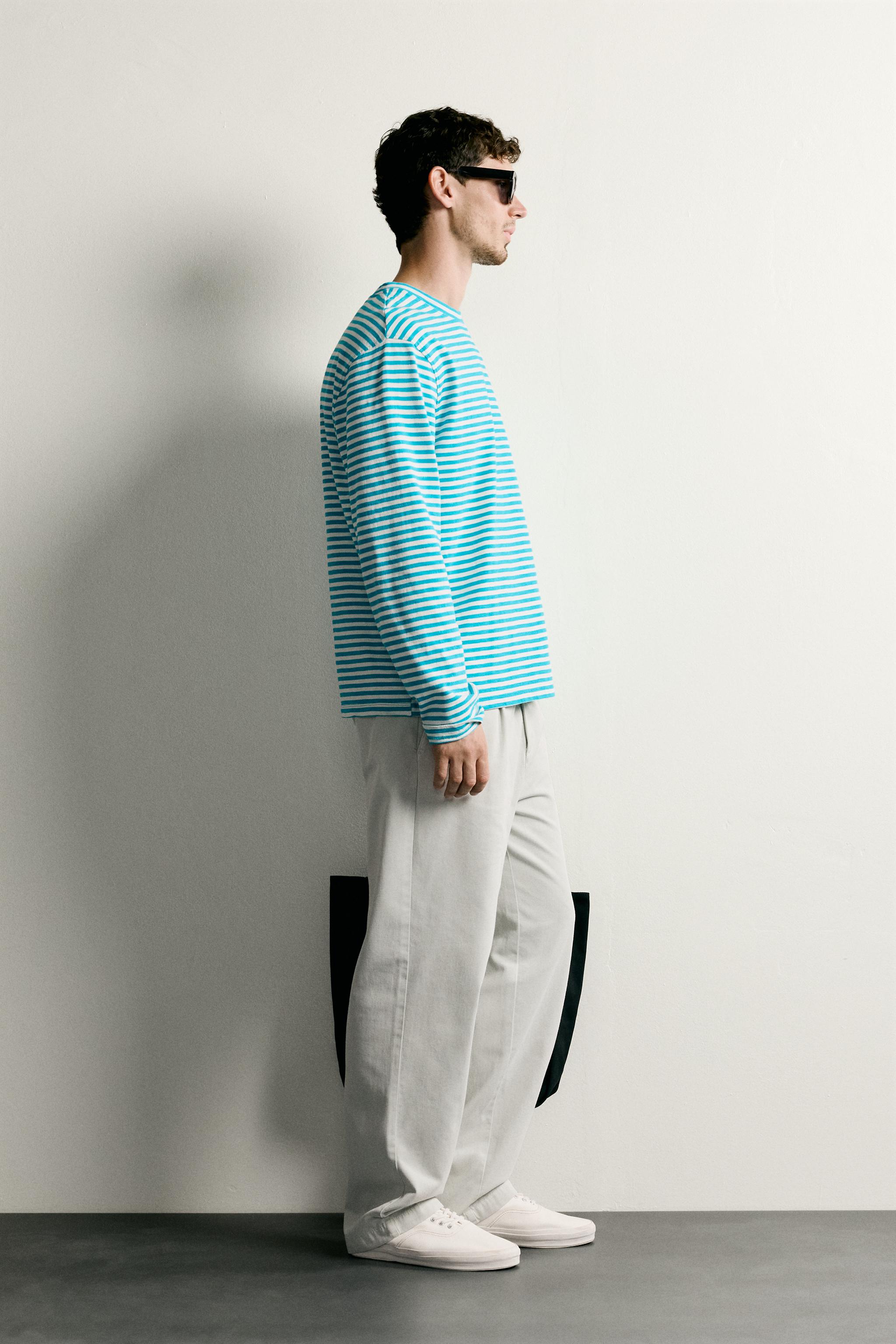 PLEATED STRAIGHT-FIT CHINO TROUSERS