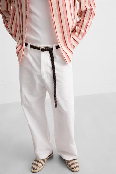 RELAXED FIT PLEATED TROUSERS - White by Zara