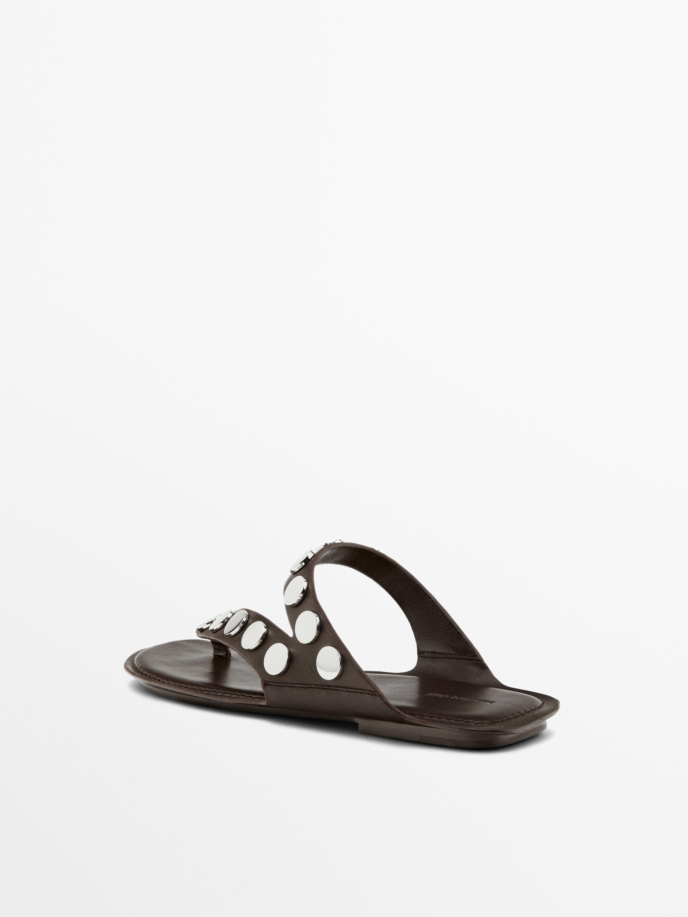 Split leather sandals with studs