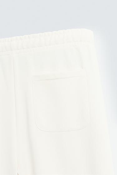 PANTALÓN JOGGER WIDE FIT - Blanco roto de Zara