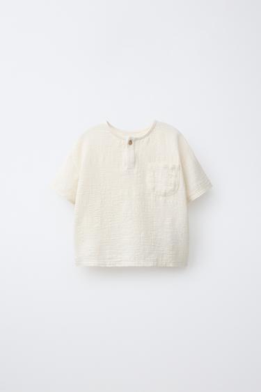 CAMISETA COMBINADA BOLSILLO - Crudo de Zara - Imagen 0