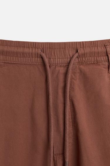 PANTALON EN POPELINE À PLIS - Tuile de Zara - Image 7