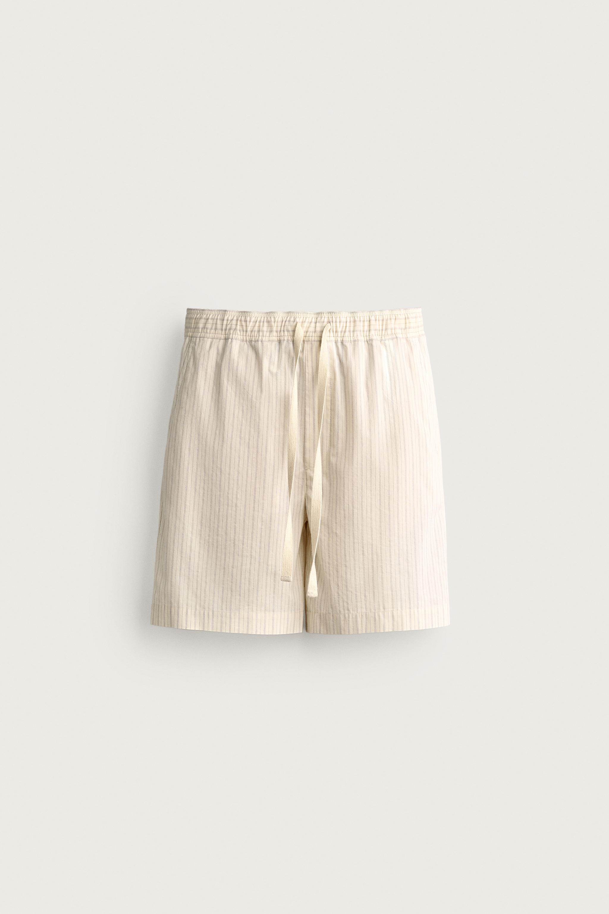 STRIPED RELAXED FIT SHORTS — Oyster-white