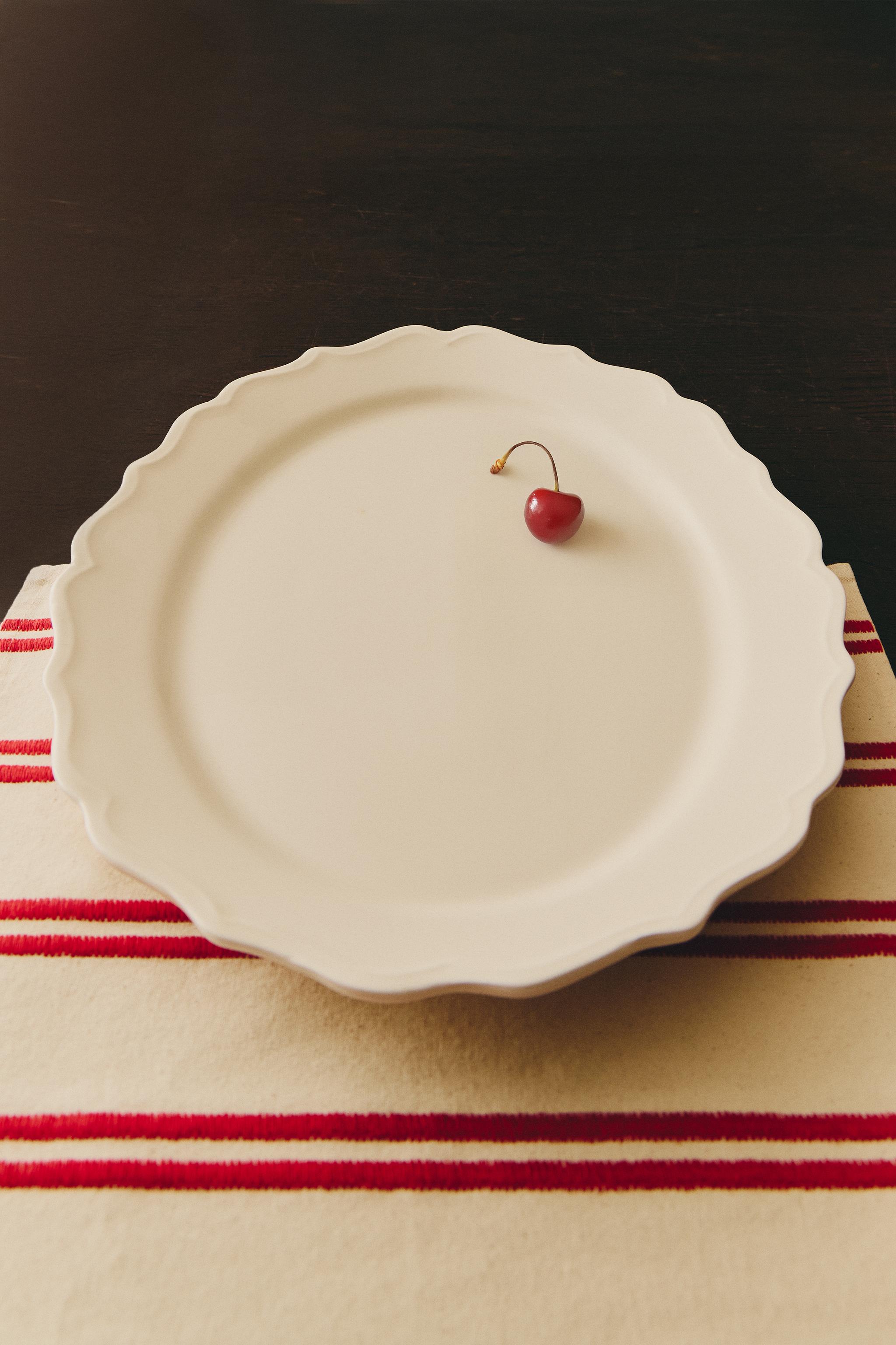 EARTHENWARE SERVING DISH WITH RAISED-DESIGN EDGE