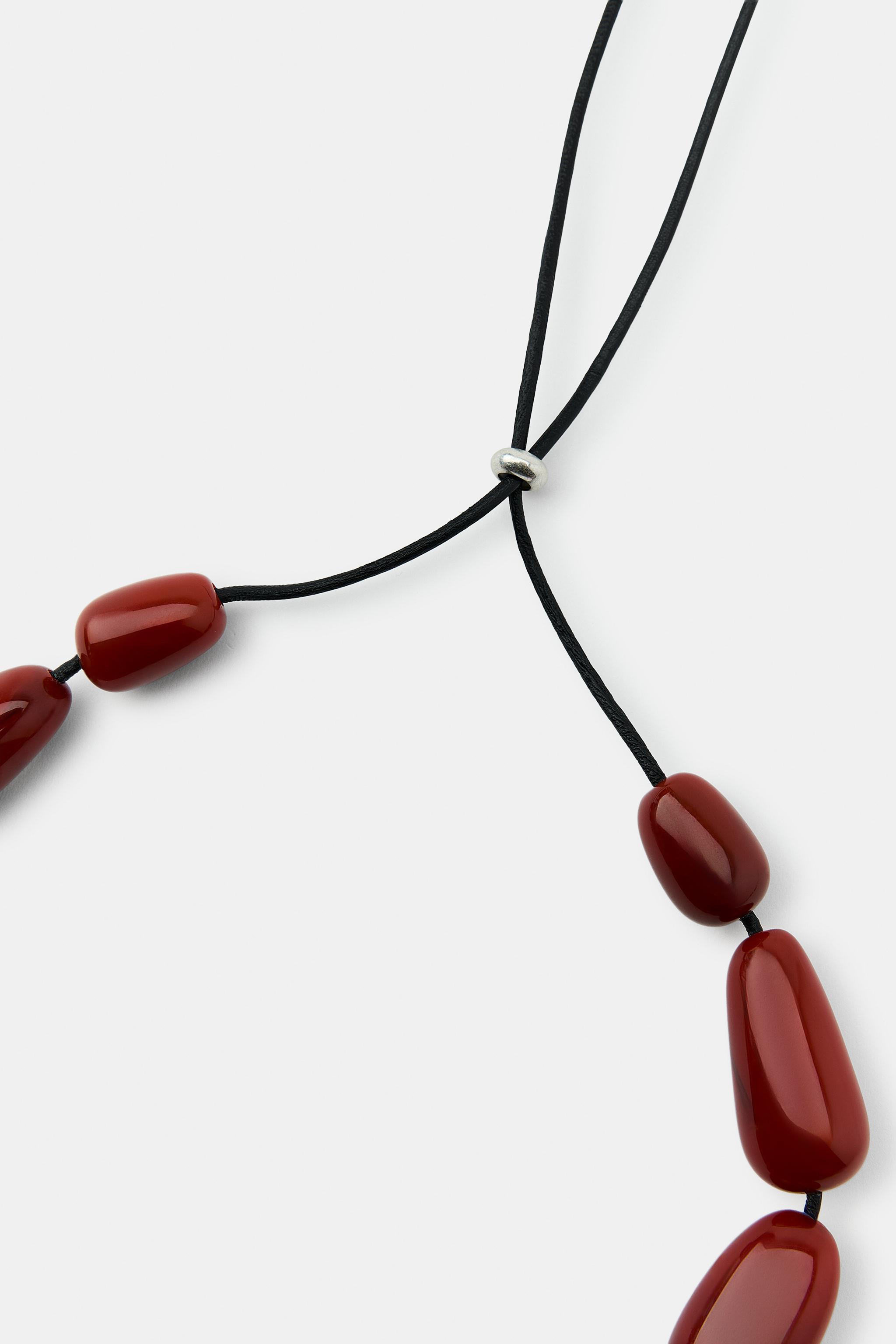 COLLIER BOULES MÉLANGE RÉSINE