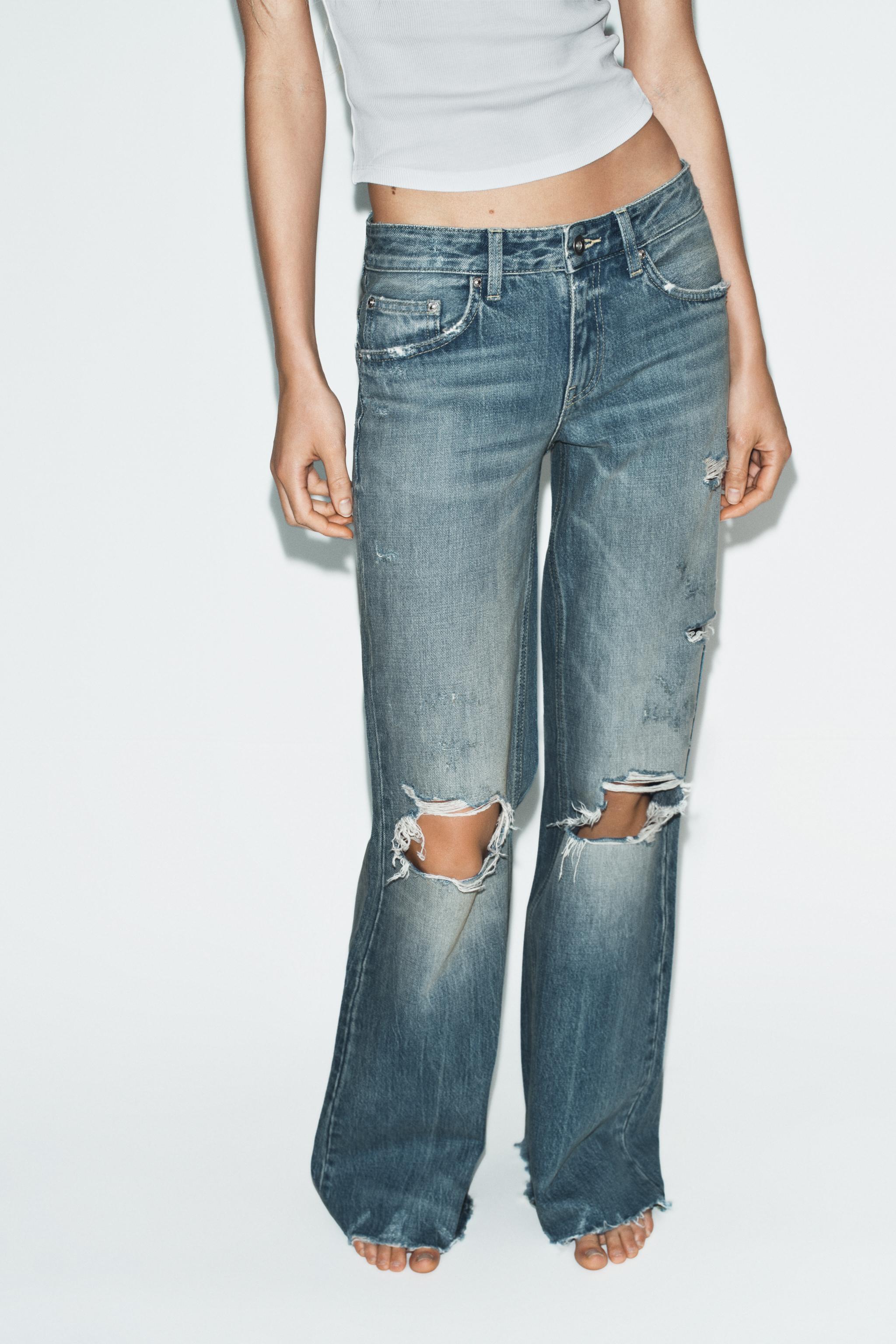 TRF FLARE RIPPED MID-RISE JEANS