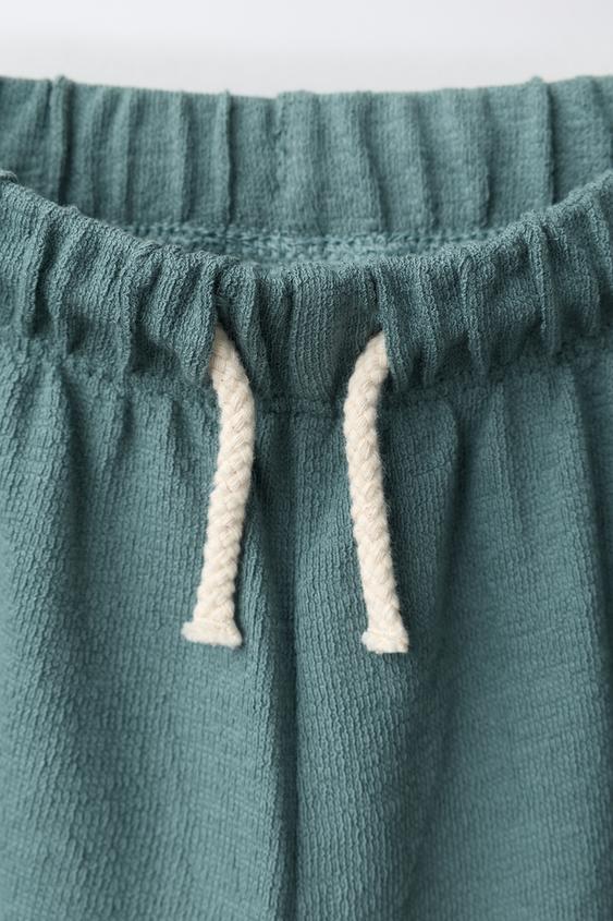 PANTALON LARGE À TEXTURE LISSE - Bleu canard de Zara - Image 2