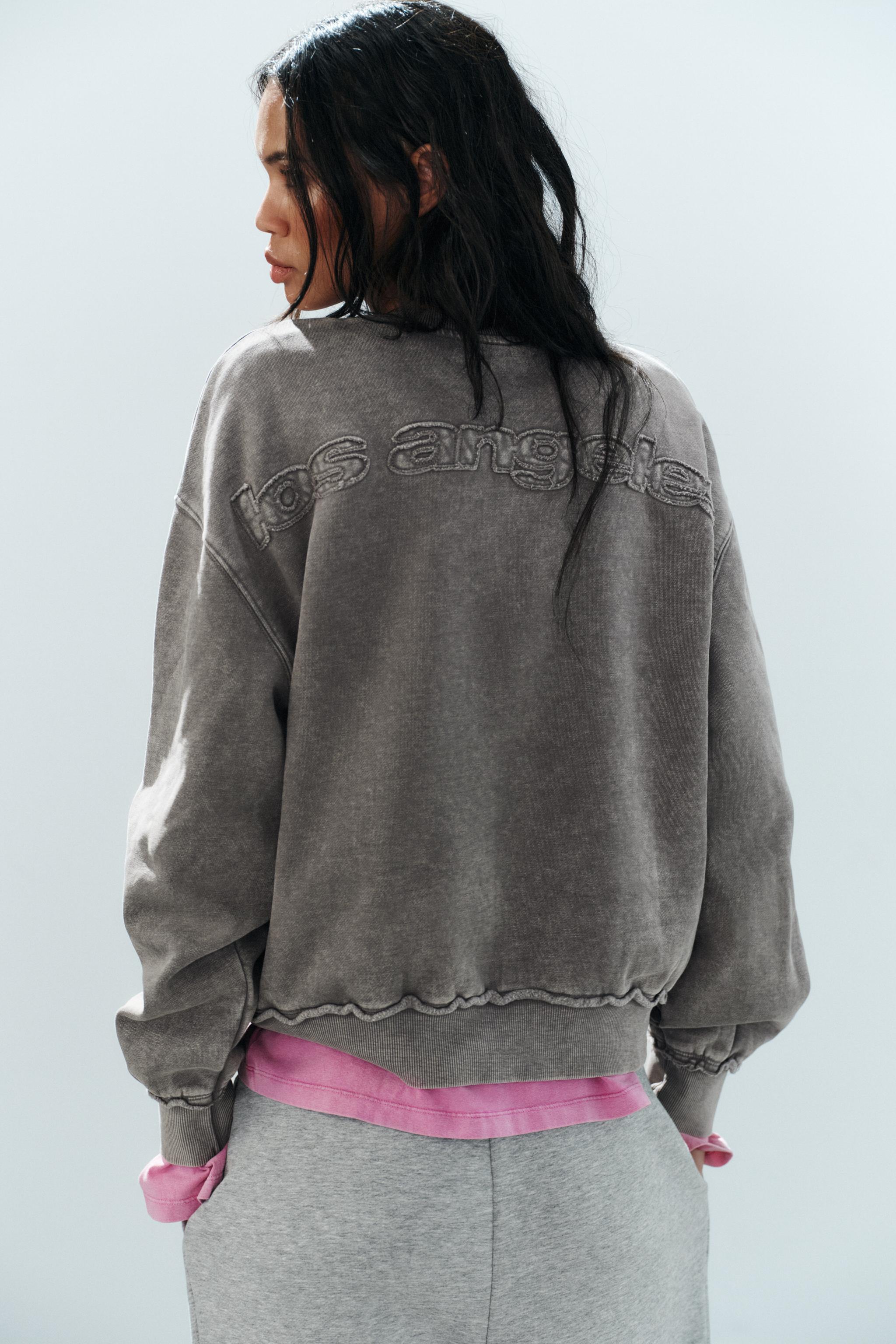STUDDED EMBROIDERED SWEATSHIRT