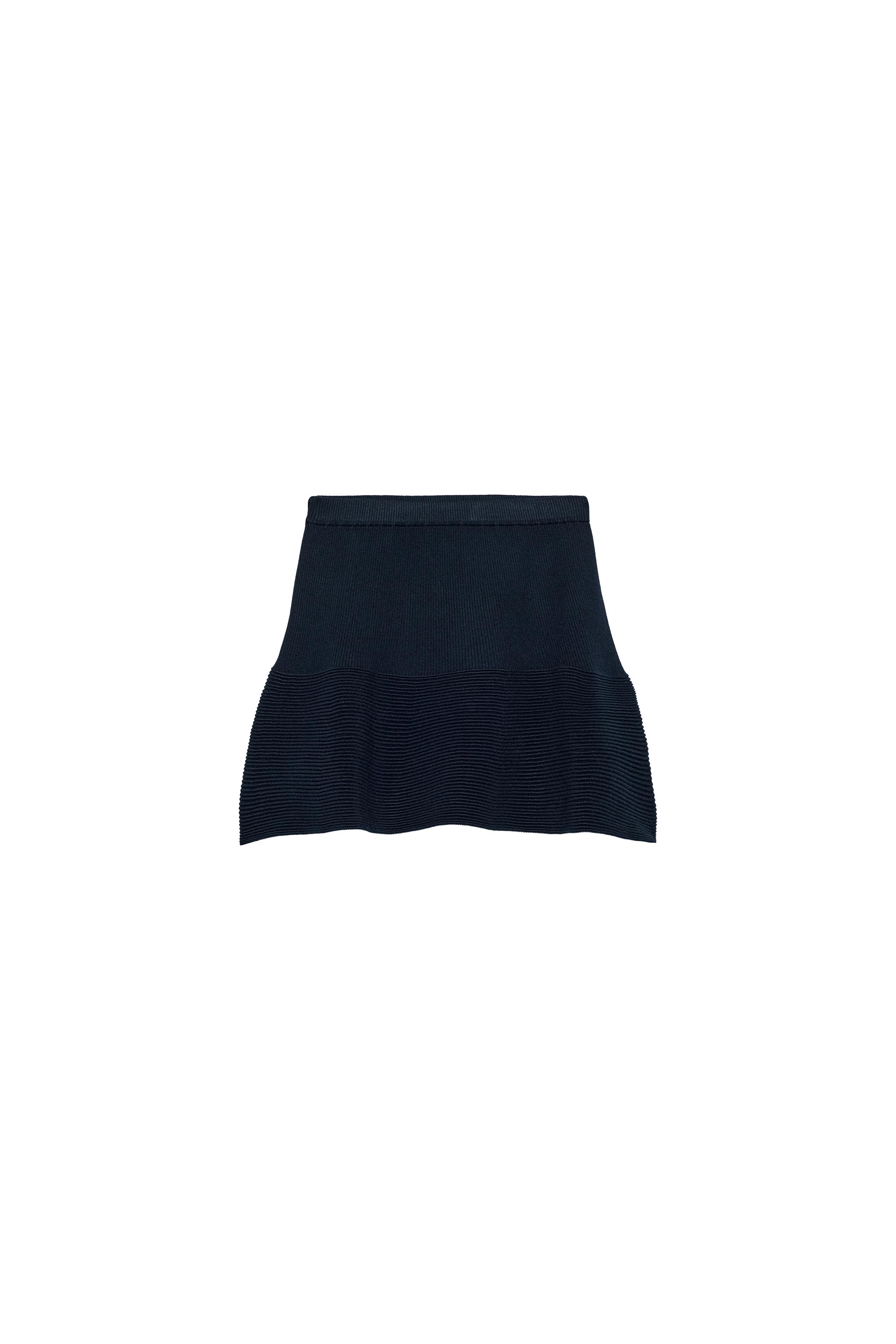 FALDA MINI PUNTO PEPLUM