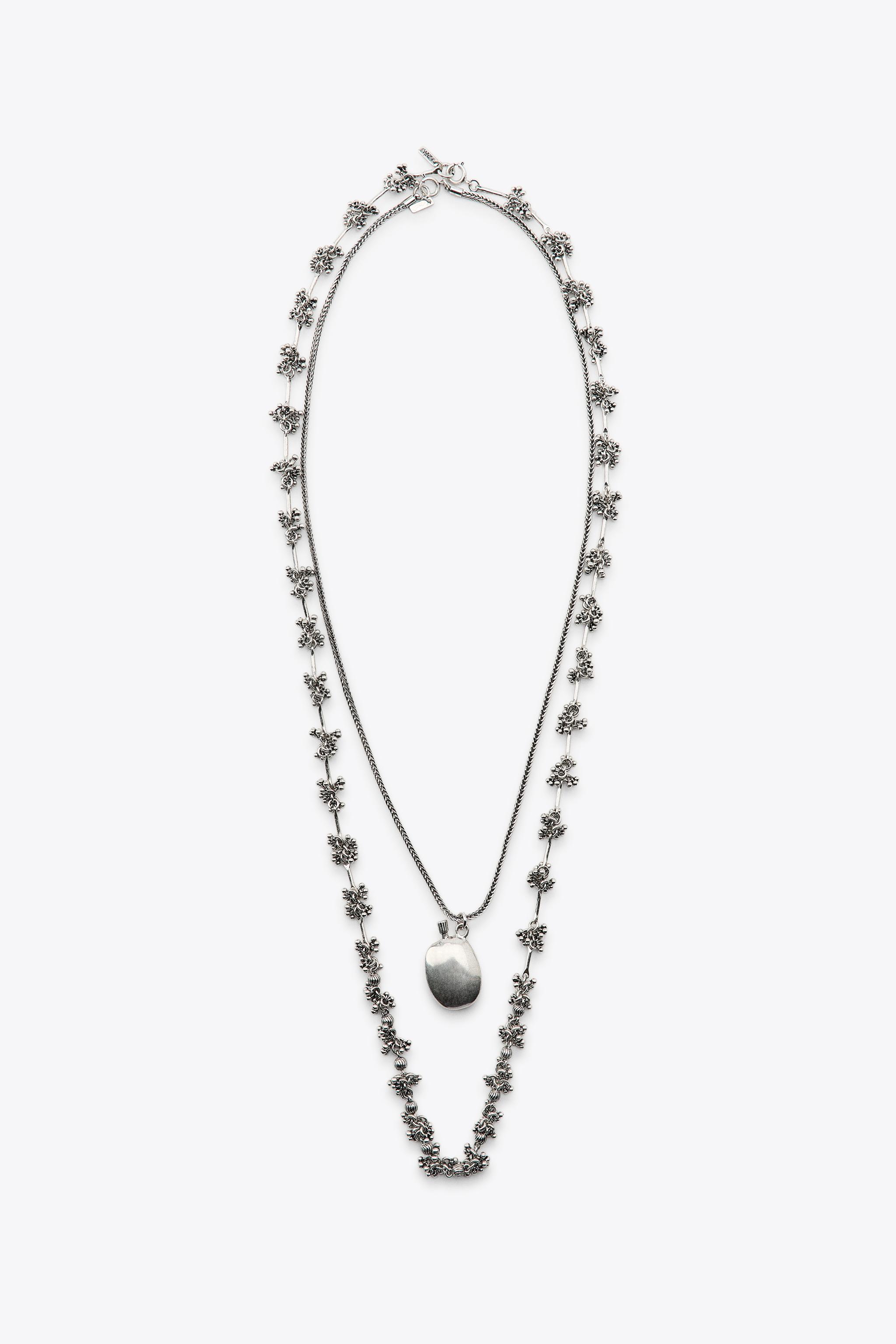 2-PACK NECKLACES WITH PIECES AND BOTTLE