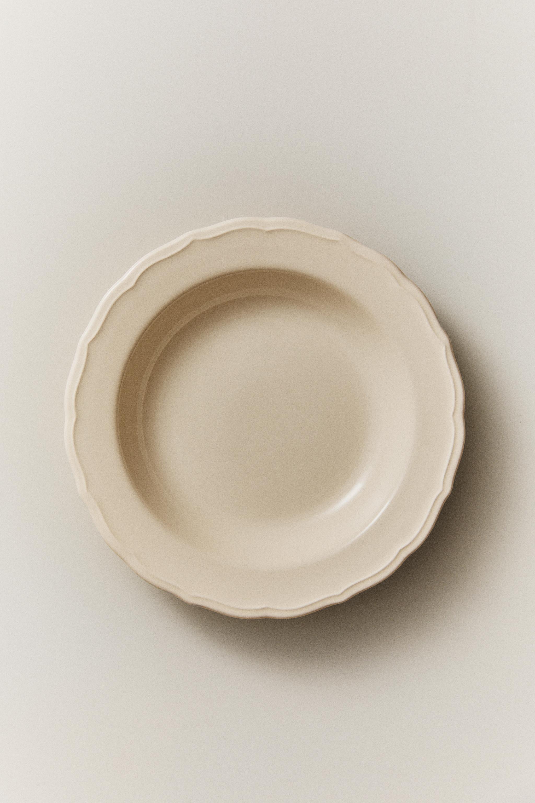 EARTHENWARE SOUP PLATE WITH RAISED-DESIGN EDGE
