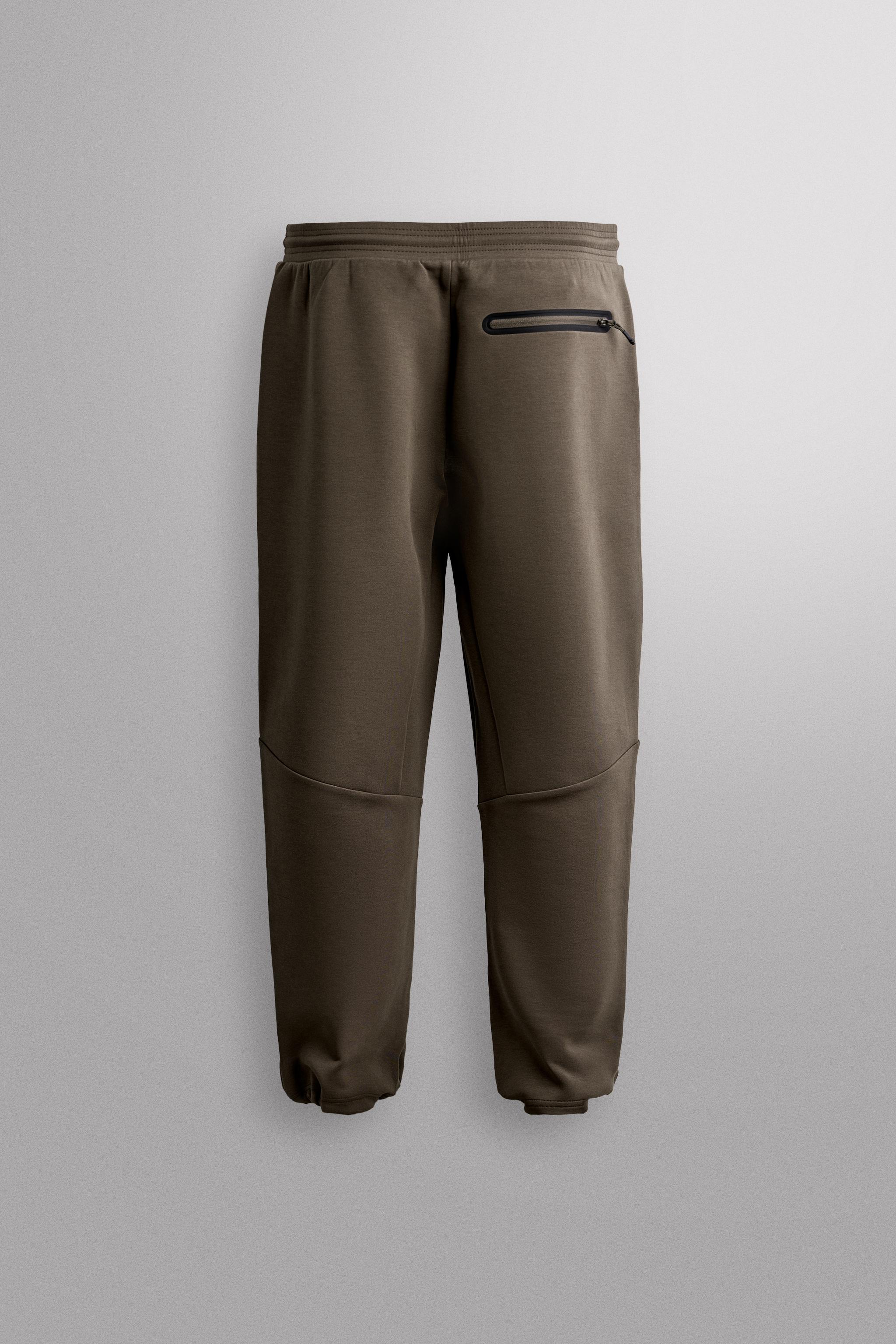 TECHNICAL JOGGER PANTS — Dark brown