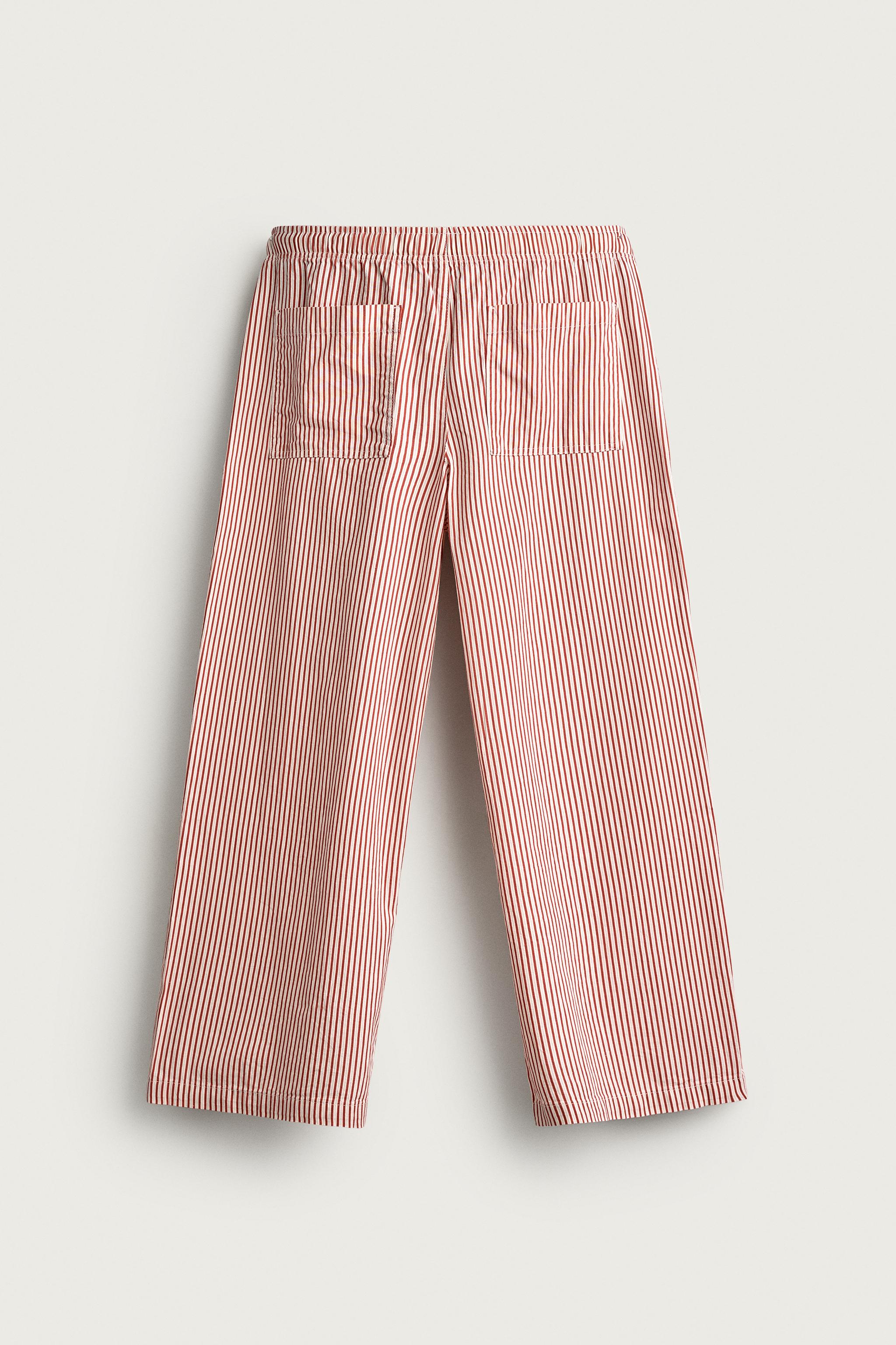 STRIPED BAGGY FIT PANTS